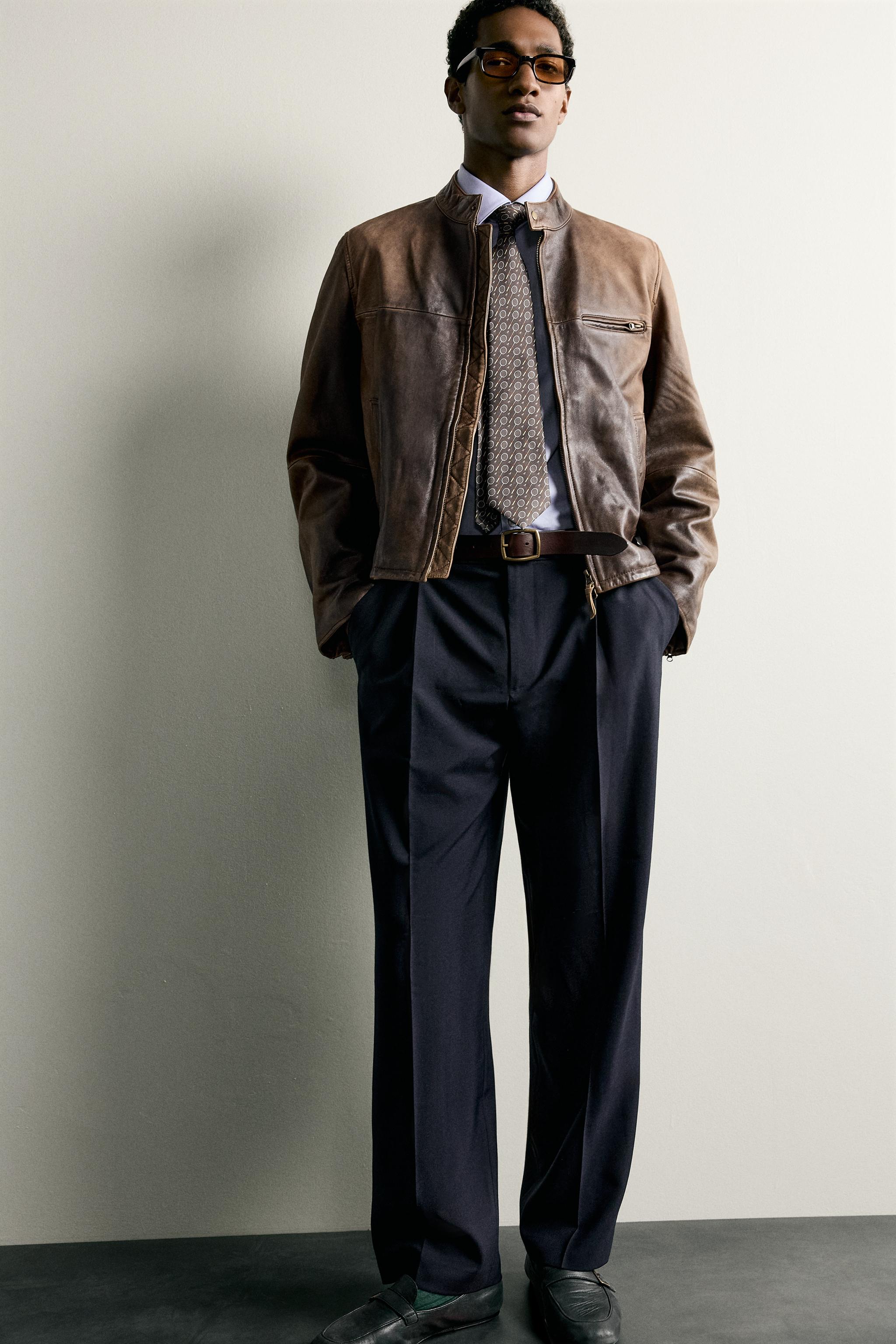 RELAXED FIT PLEATED PANTS