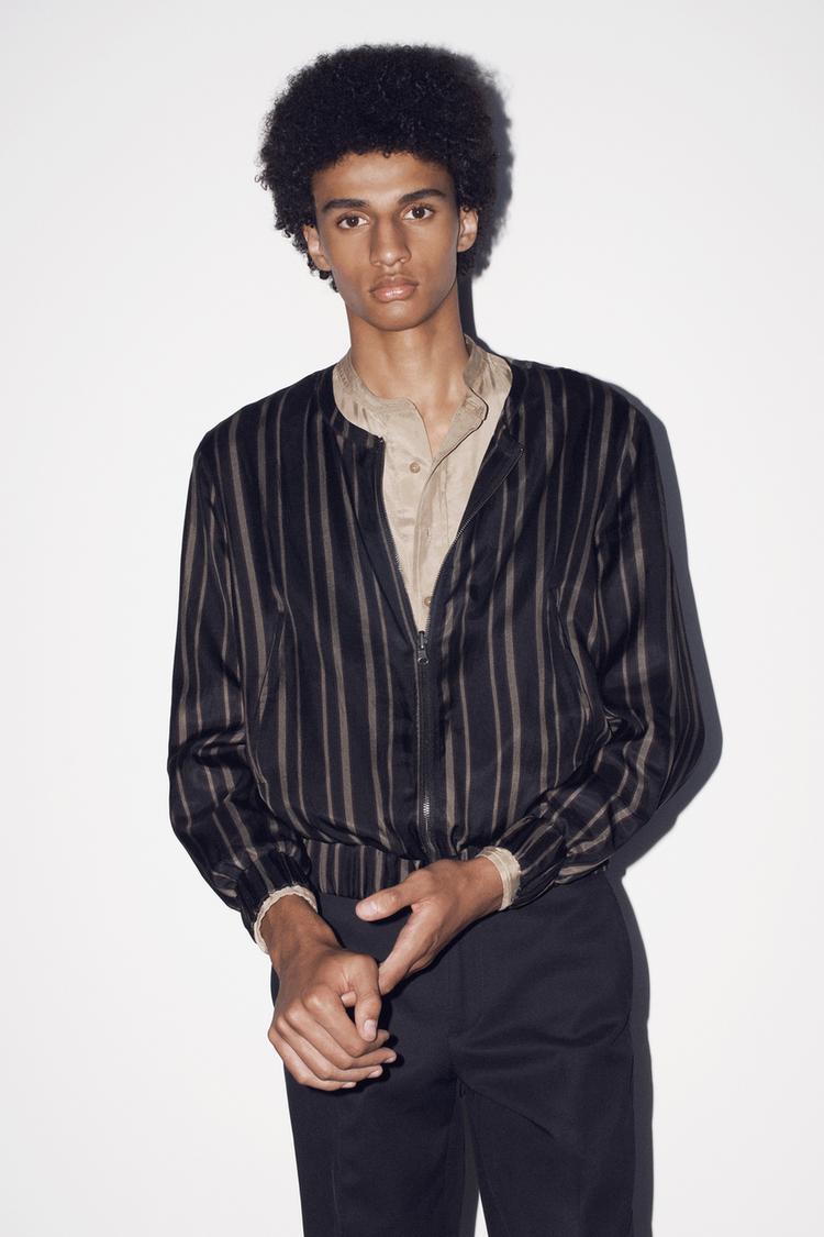 Pantalon slim fit botones