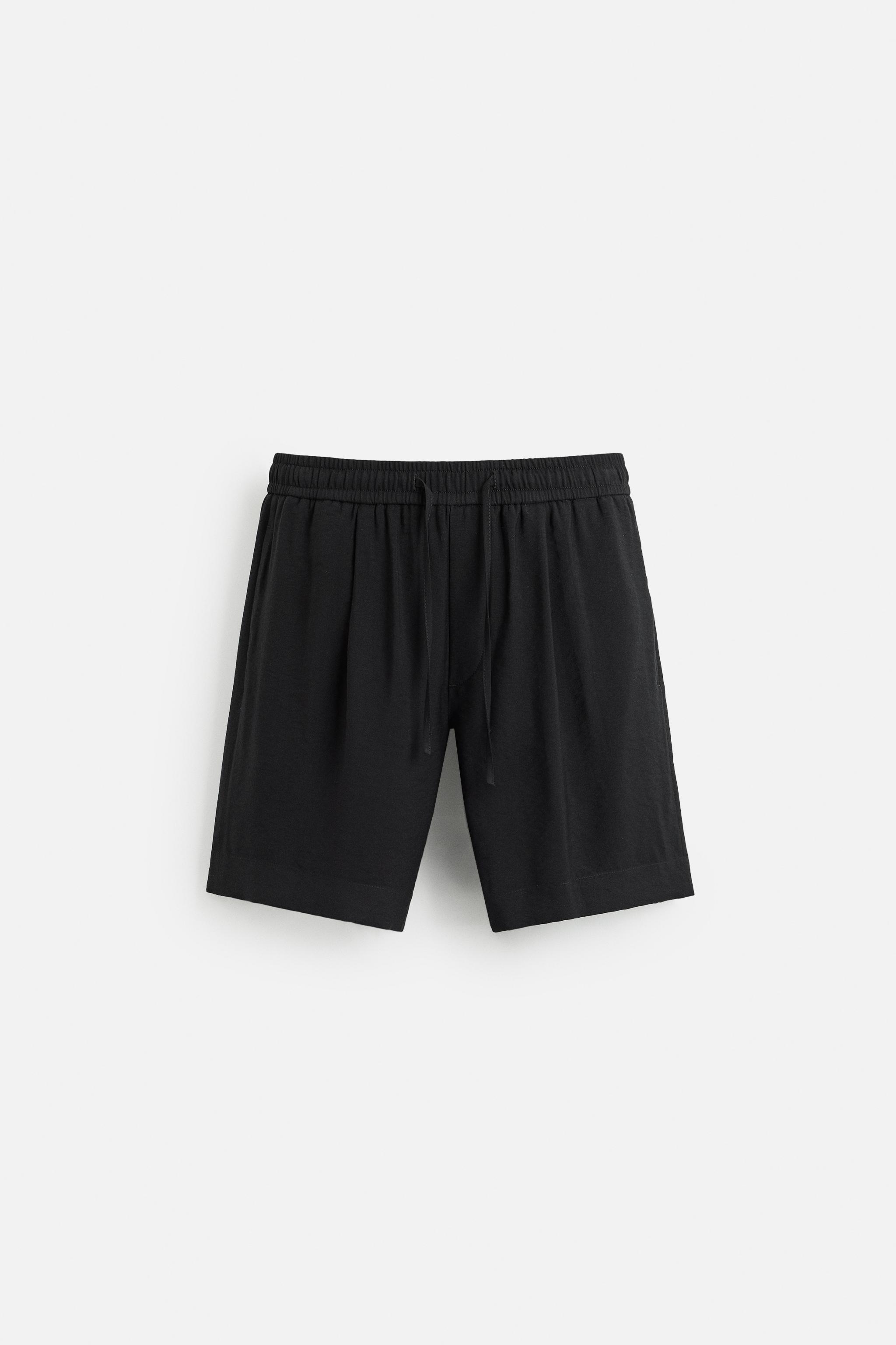 FLOWY RELAXED FIT BERMUDA SHORTS