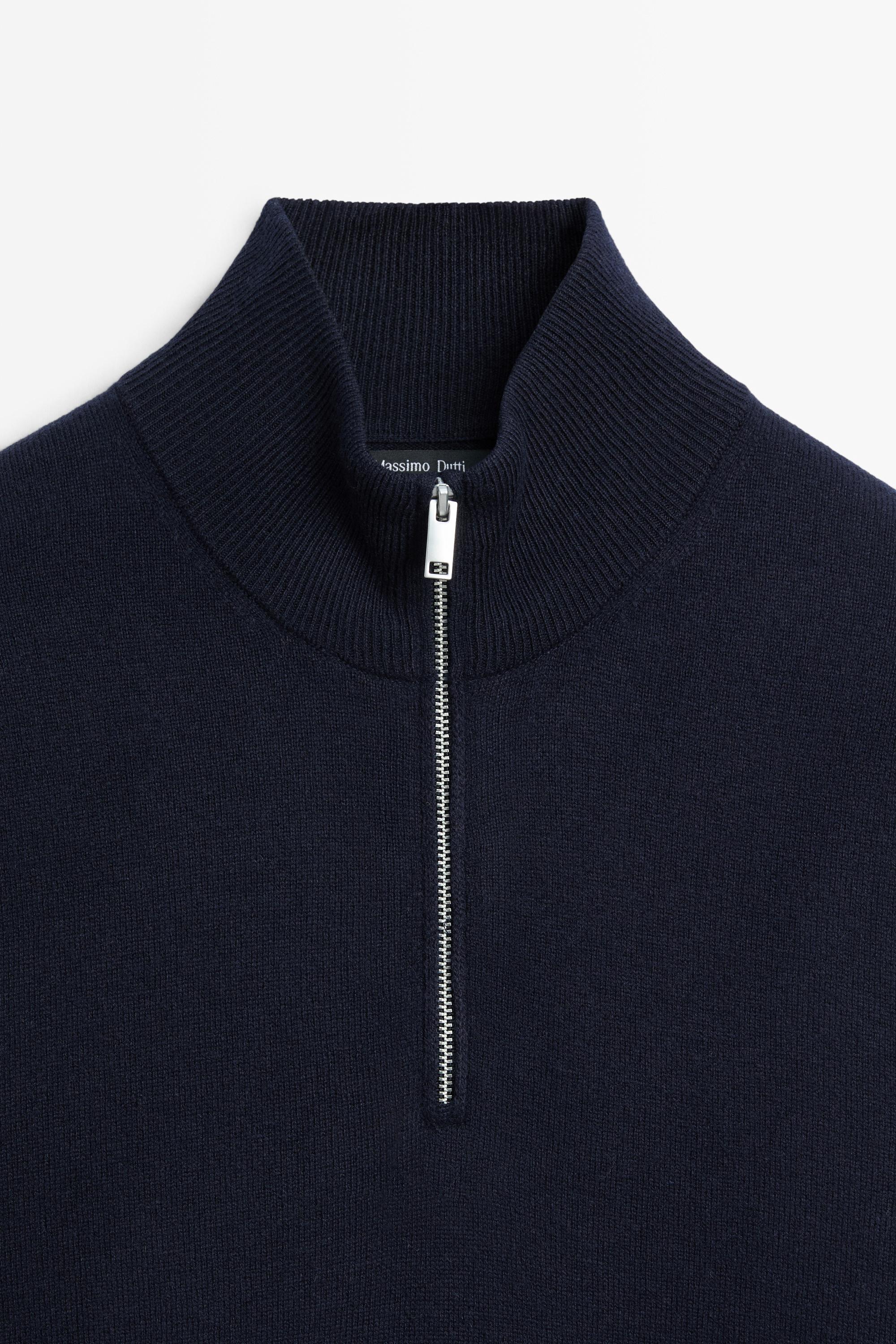Pull en maille col montant zippé