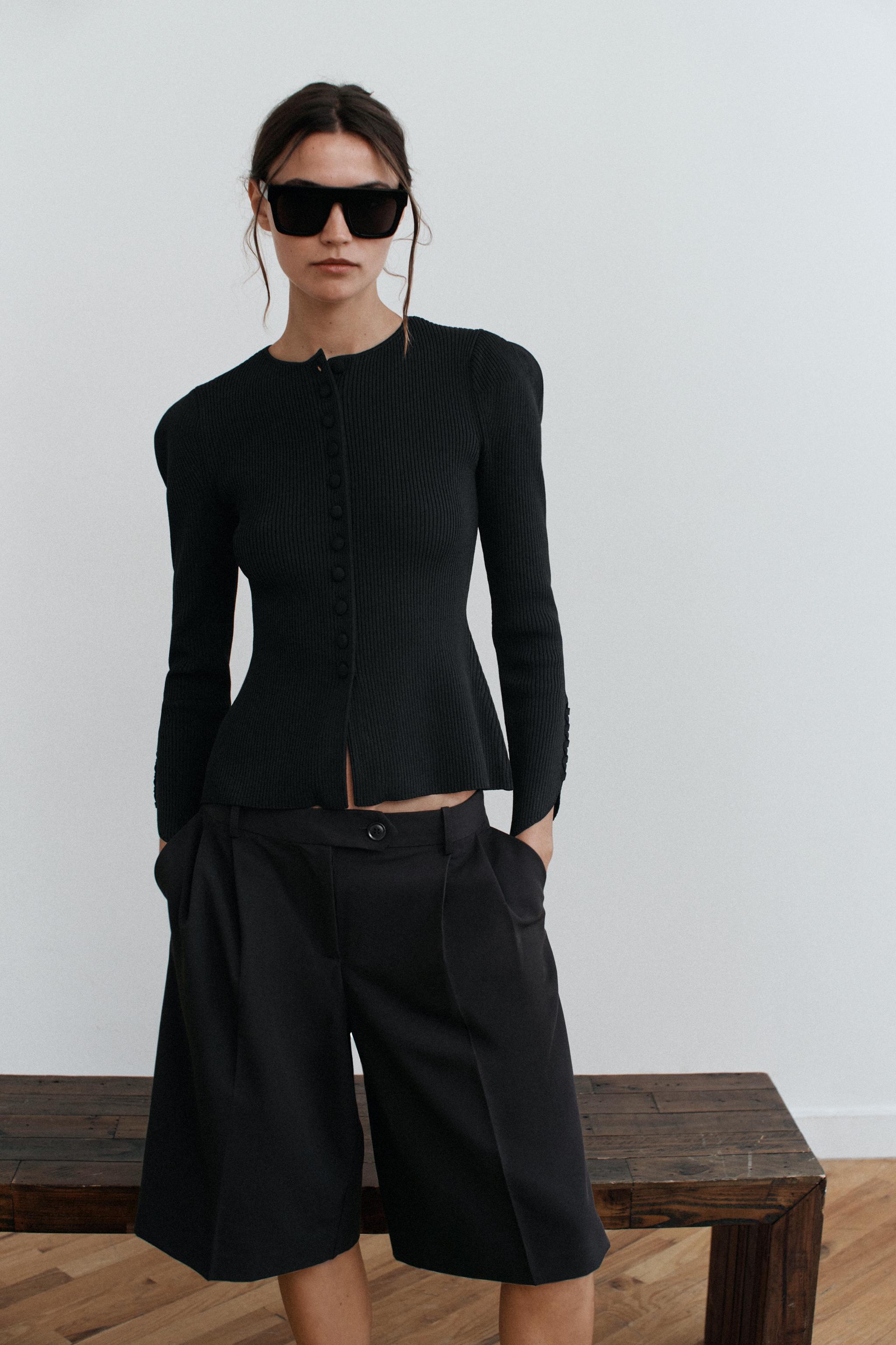 VESTE EN MAILLE À MANCHES BOUFFANTES