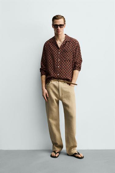 قميص منسدل بطبعة هندسية - أسود/ برتقالي الخاص بـ Zara - صورة 0