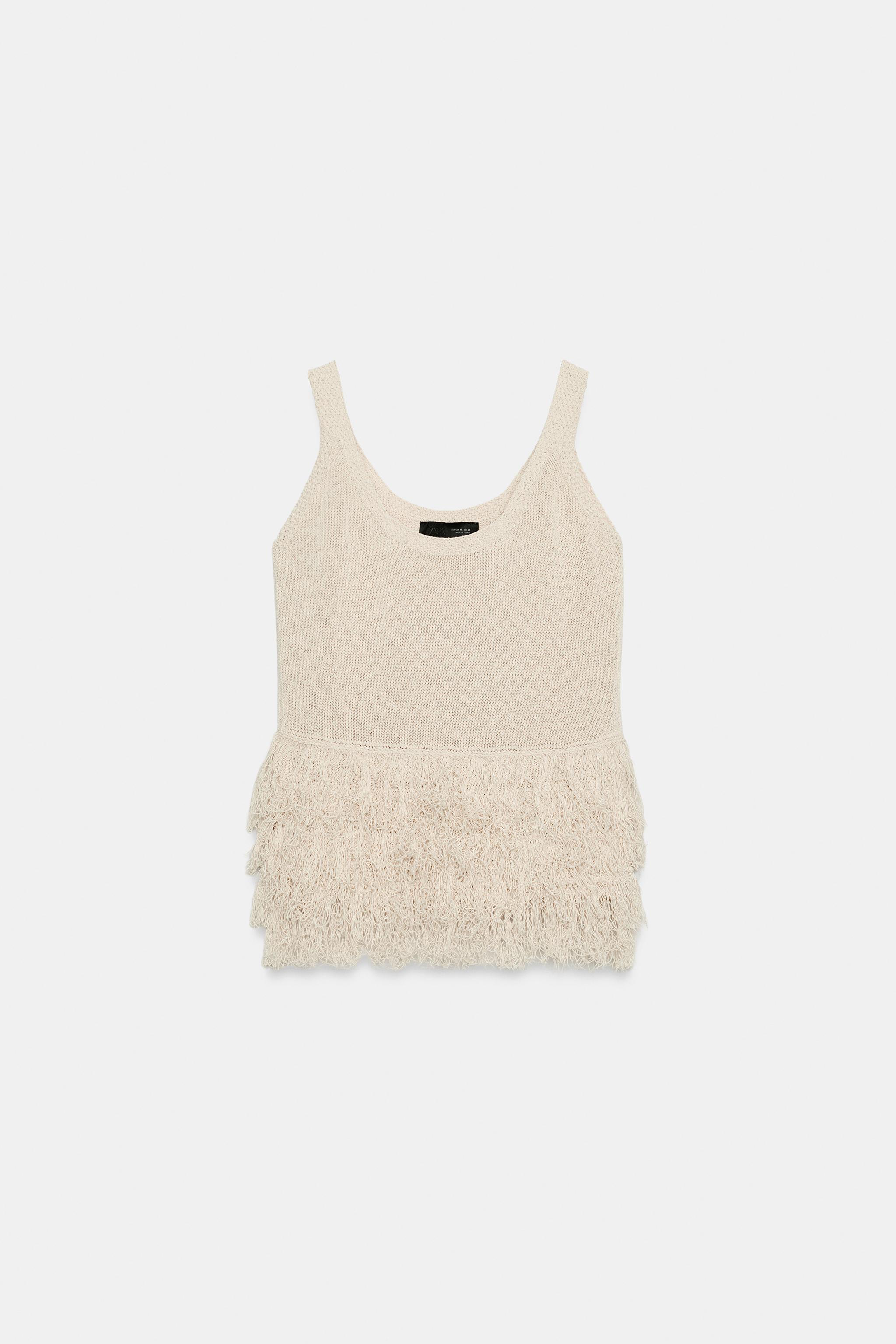 TOP EN MAILLE À FRANGES