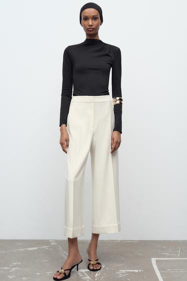 PANTALÓN ANCHO BAJO VUELTA - Crudo de Zara - Imagen 0