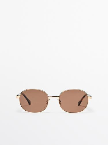 Gafas de sol metálicas - carey redondas - Oro de Zara - Imagen 0