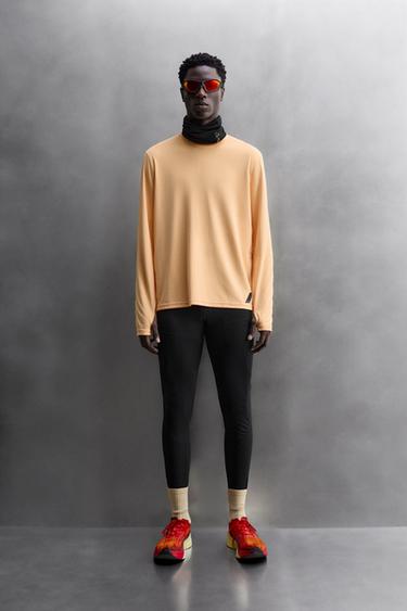 CAMISETA RUNNING MANGA LARGA - Naranja de Zara - Imagen 0