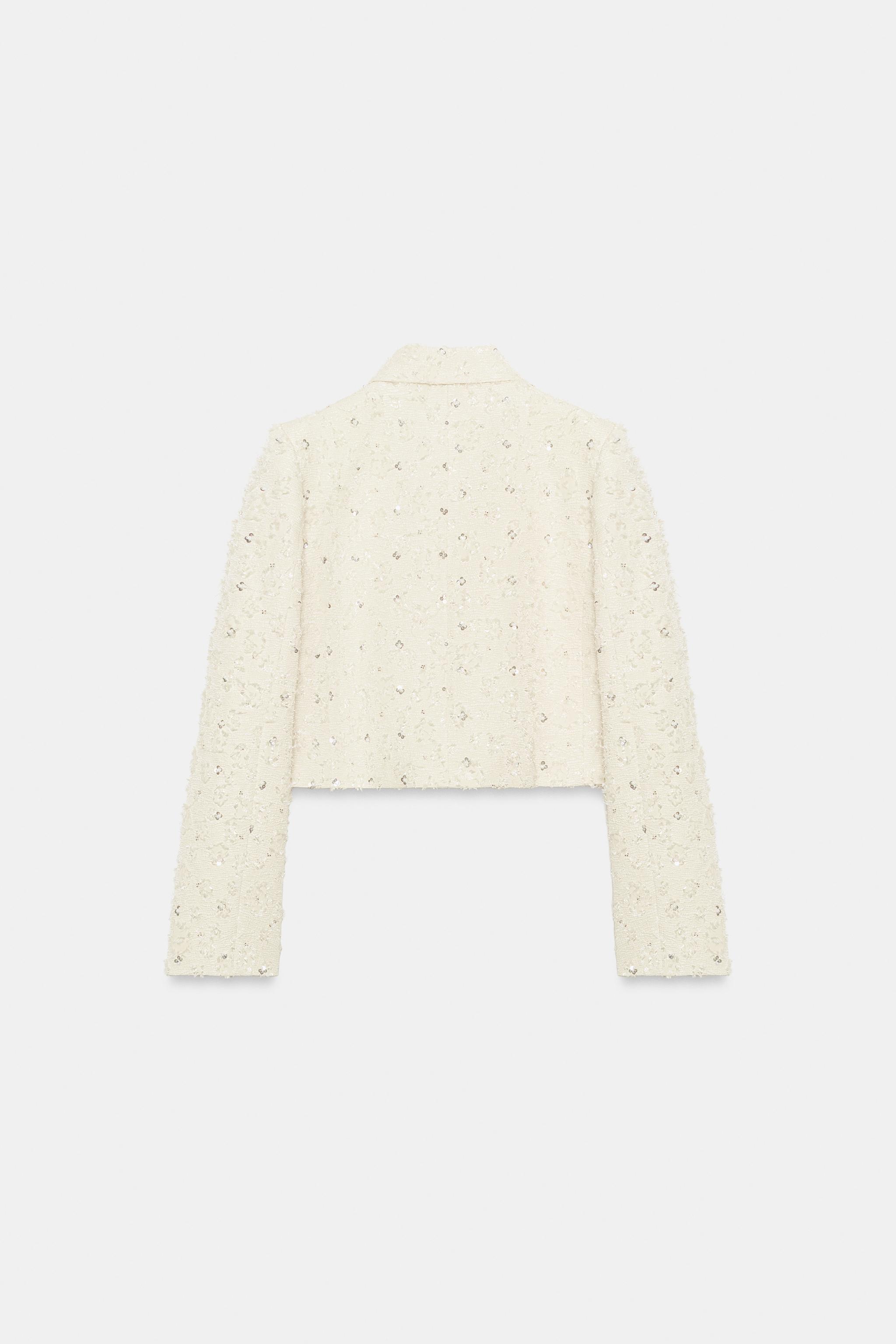 VESTE COURTE EFFRANGÉE À FANTAISIE