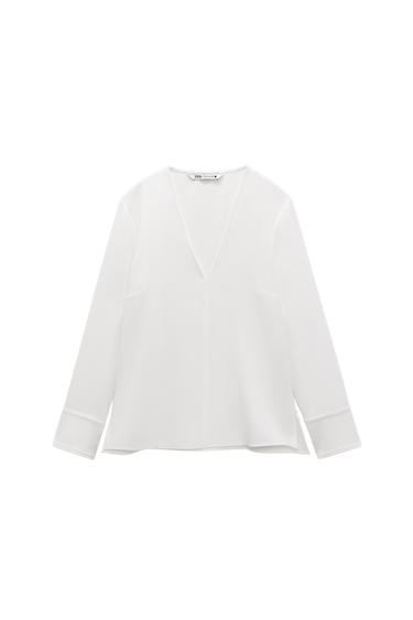BLOUSE WITH SIDE VENTS