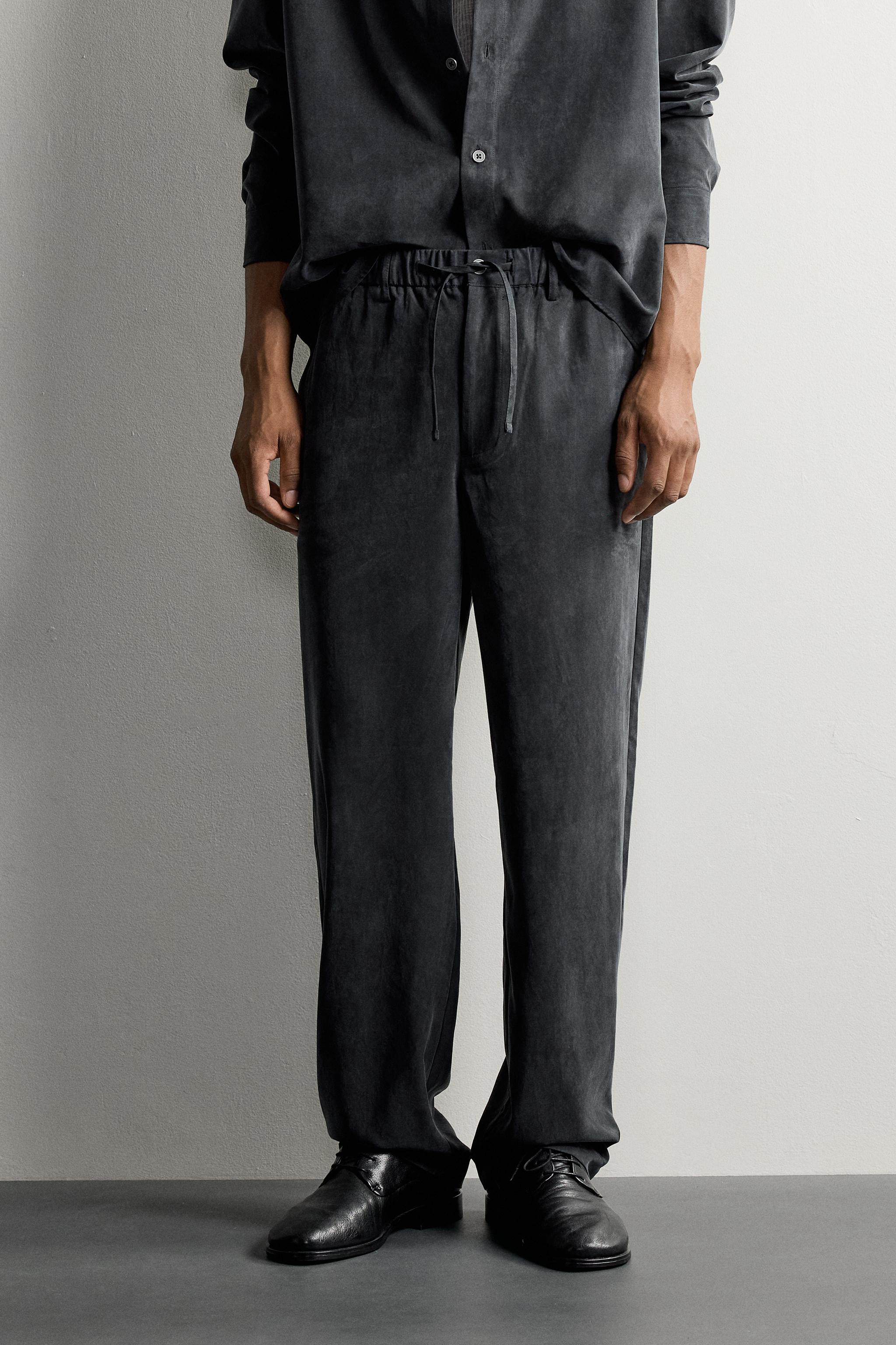 RELAXED FIT FLOWY PANTS — Indigo