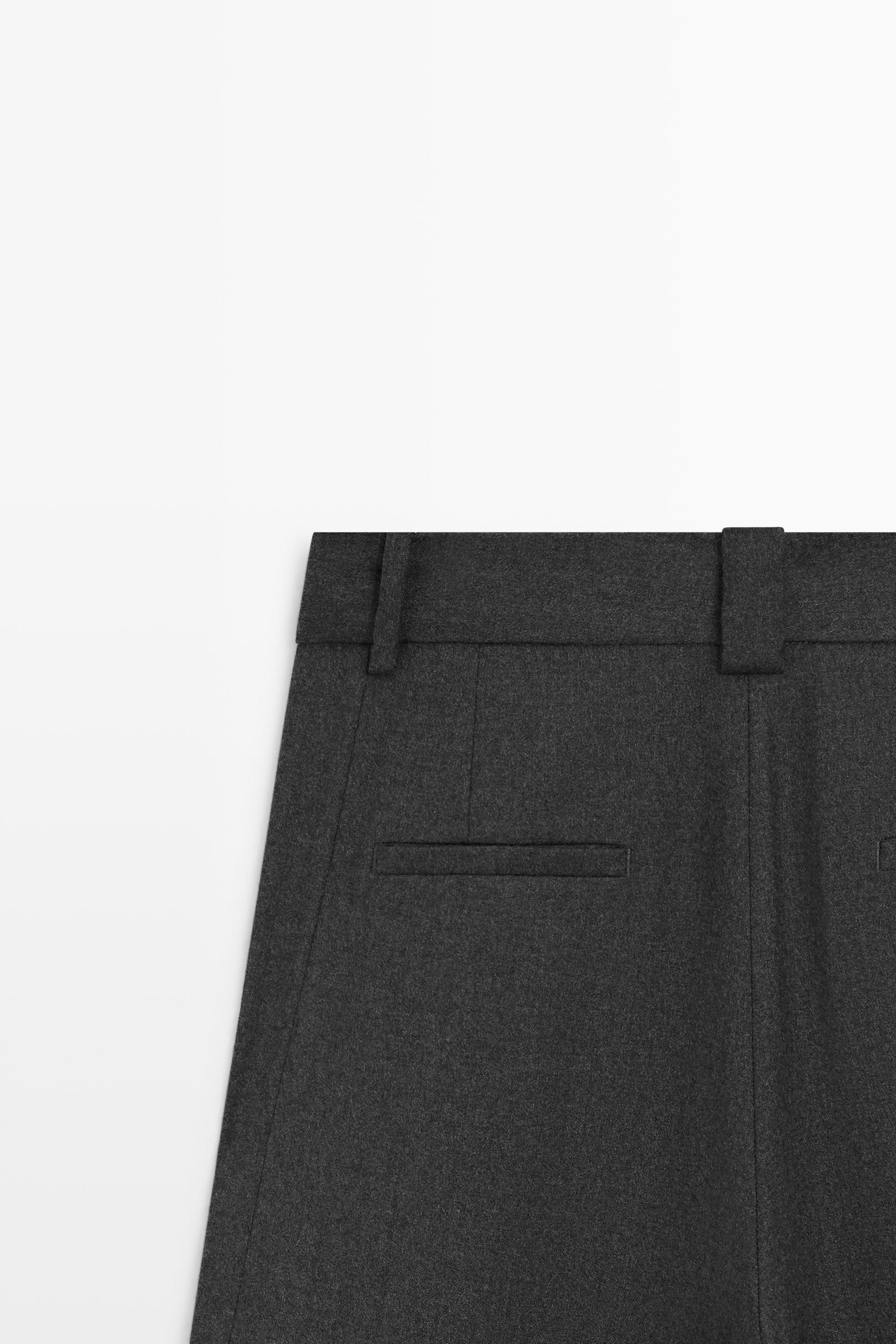 Pantalon flanelle à plis et détail bas