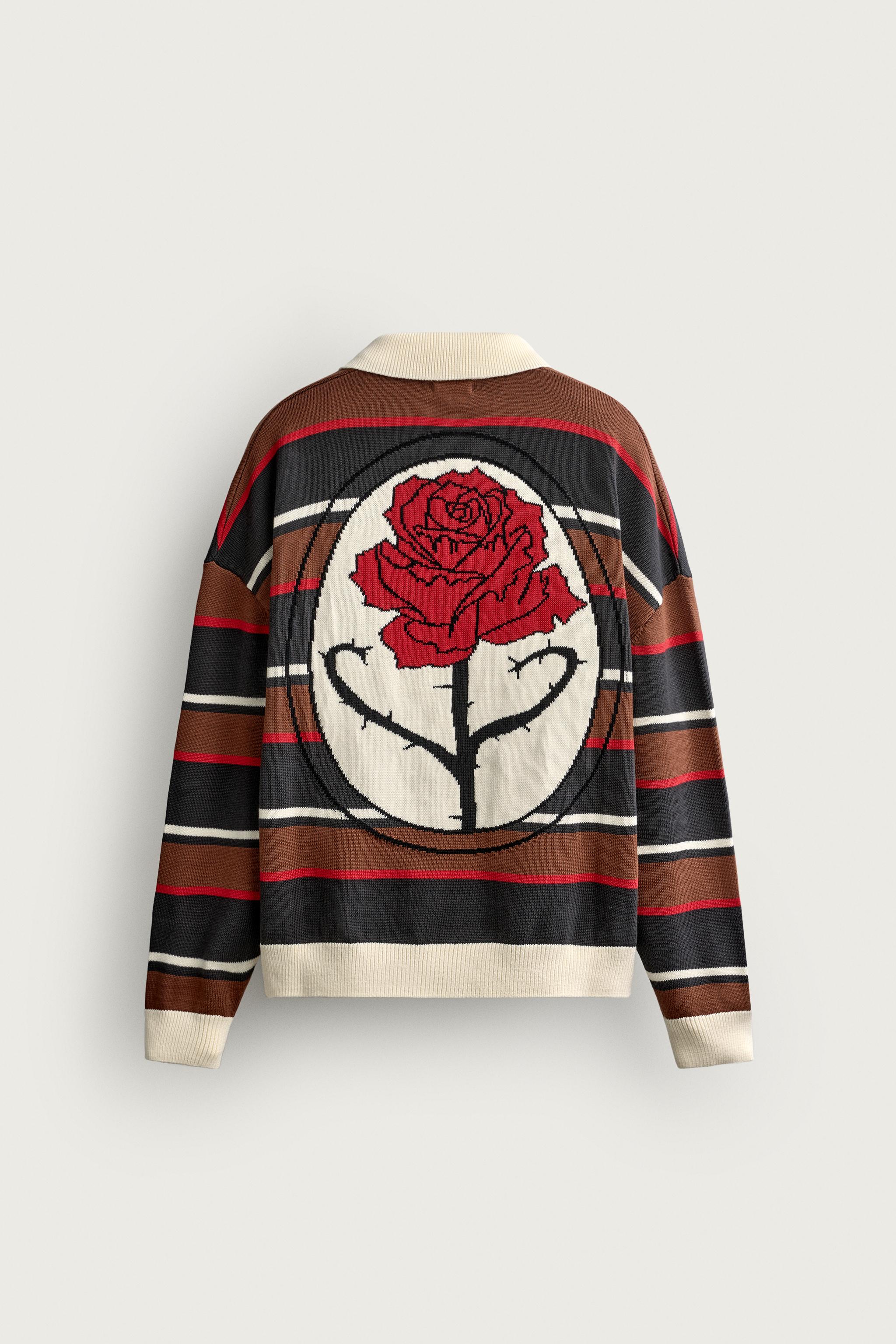 POLO EN MAILLE À RAYURES ET INTARSIA FLEUR