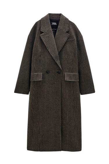 Front view of a plaid coat with lapels and front pockets.