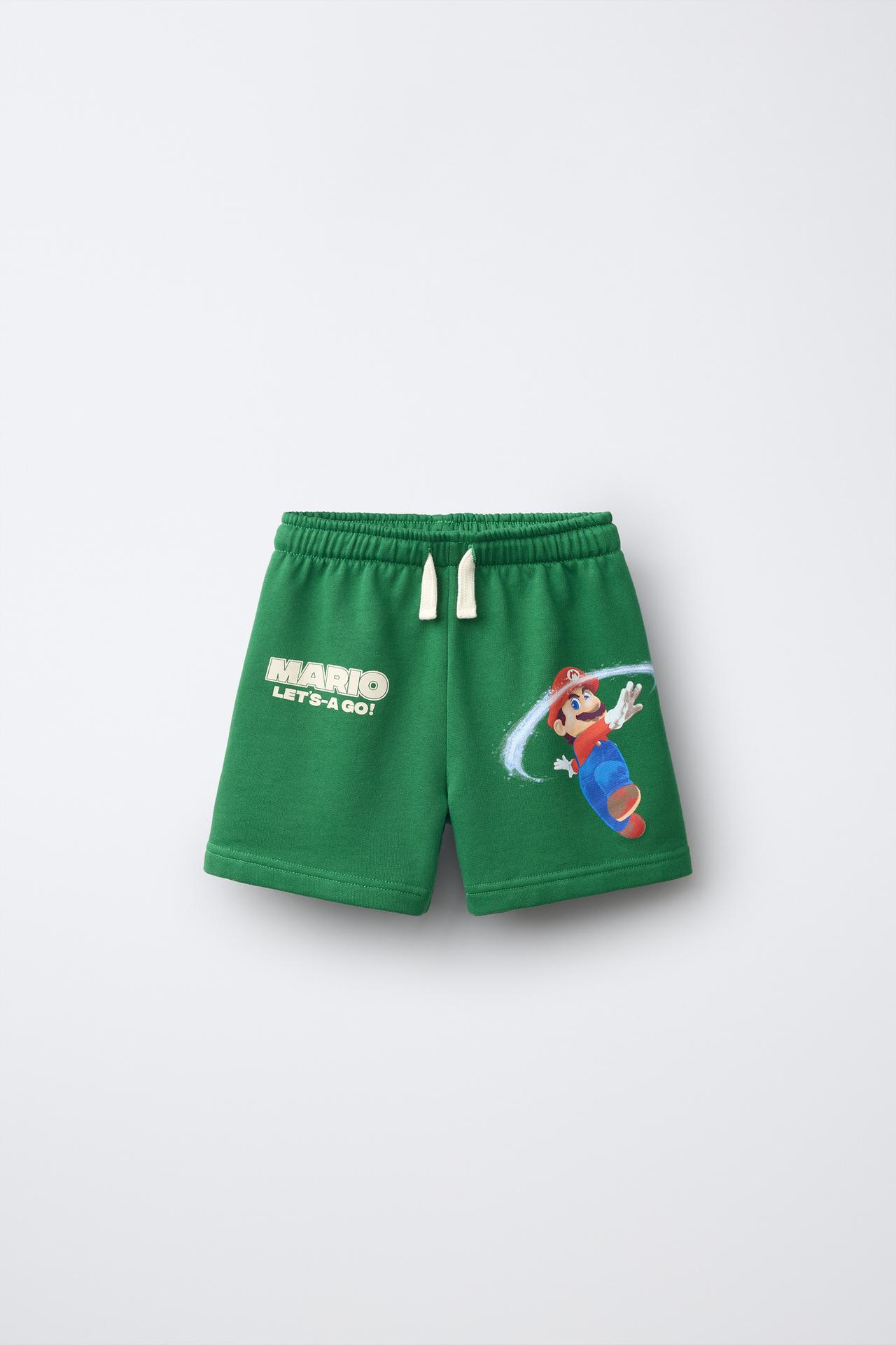 MARIO BROS.™ © NINTENDO PRINT BERMUDA SHORTS — Green