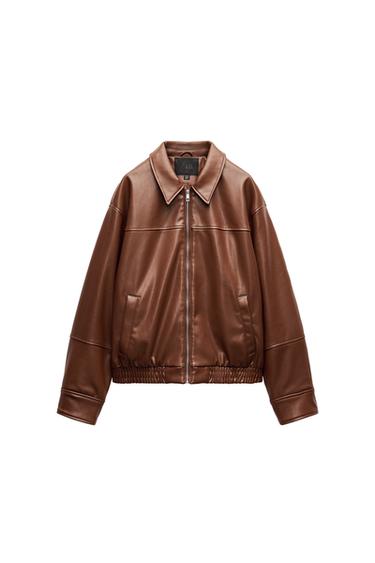 Front view of a brown jacket with a zip and side pockets.