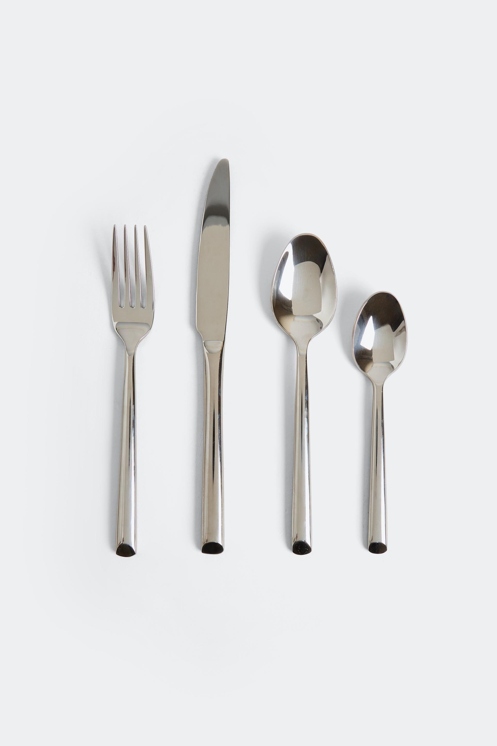 4-PIECE FORGED STEEL FLATWARE SET — Steel