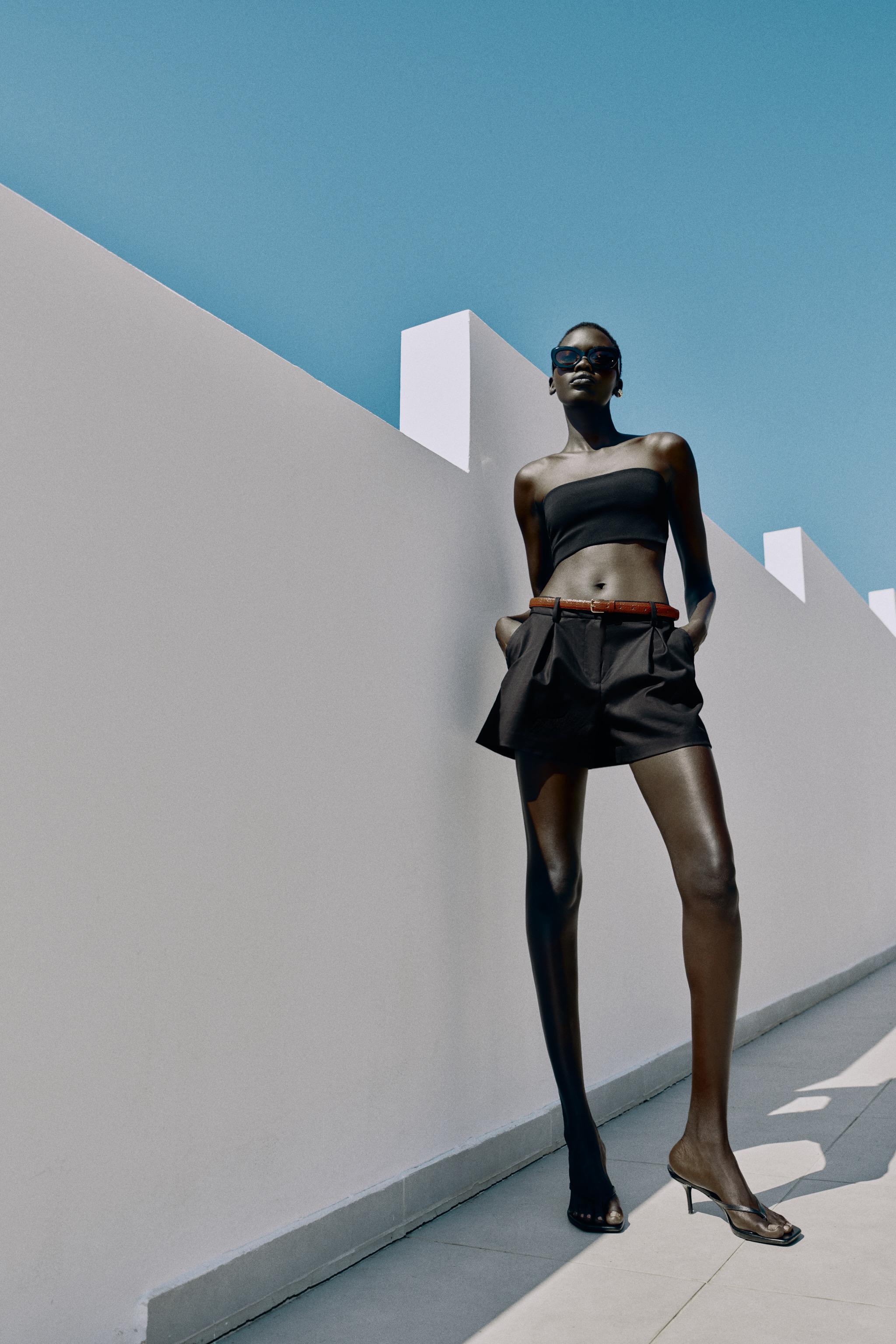 BELTED PLEATED SHORTS — Black