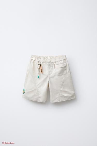 CELANA BERMUDA ELASTIS STRAIGHT CHARM BUTTERBEAR© - Ecru dari Zara