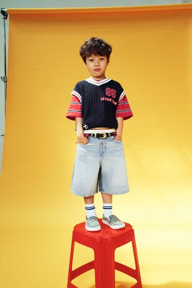 フットボールワッペンニットベストネイビーブルーZaraのフットボールワッペンニットベスト - ネイビーブルー