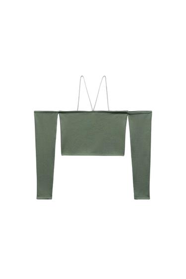 Olive green long-sleeved top with thin straps and a straight neckline, on a white background.