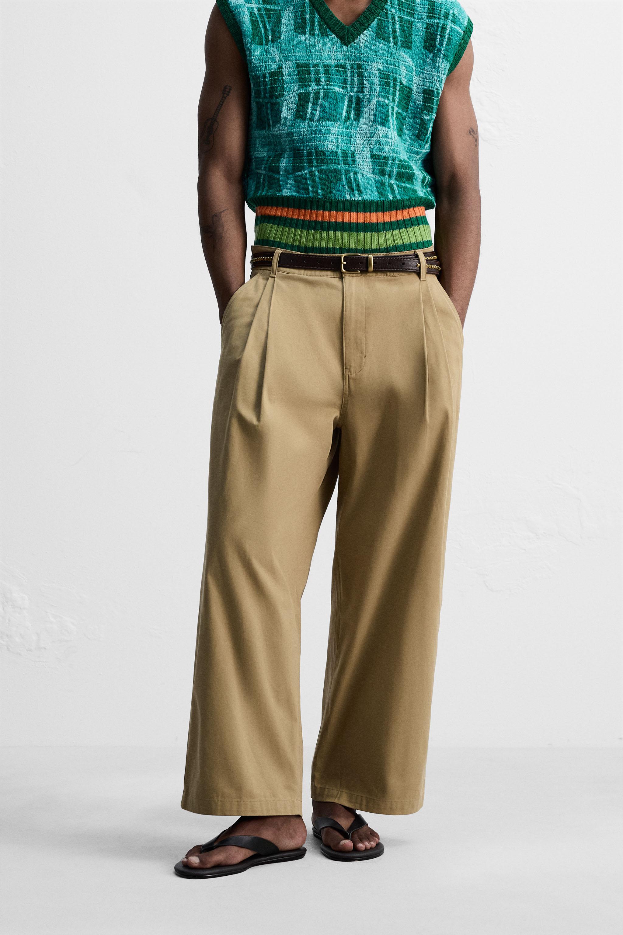 PLEATED WIDE FIT PANTS