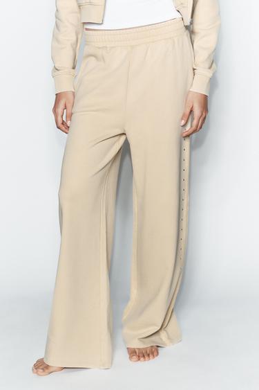 WASHED-EFFECT FLEECE TROUSERS WITH STUDS - Butter by Zara