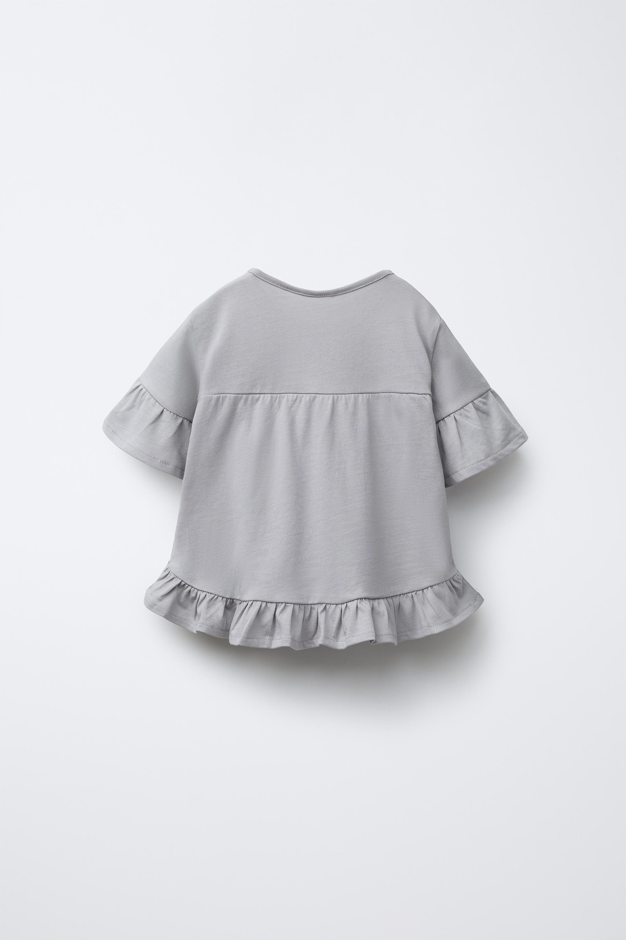 ホワイト フリル付き Tシャツ フリル付きホワイトTシャツ 140センチ - メルカリ