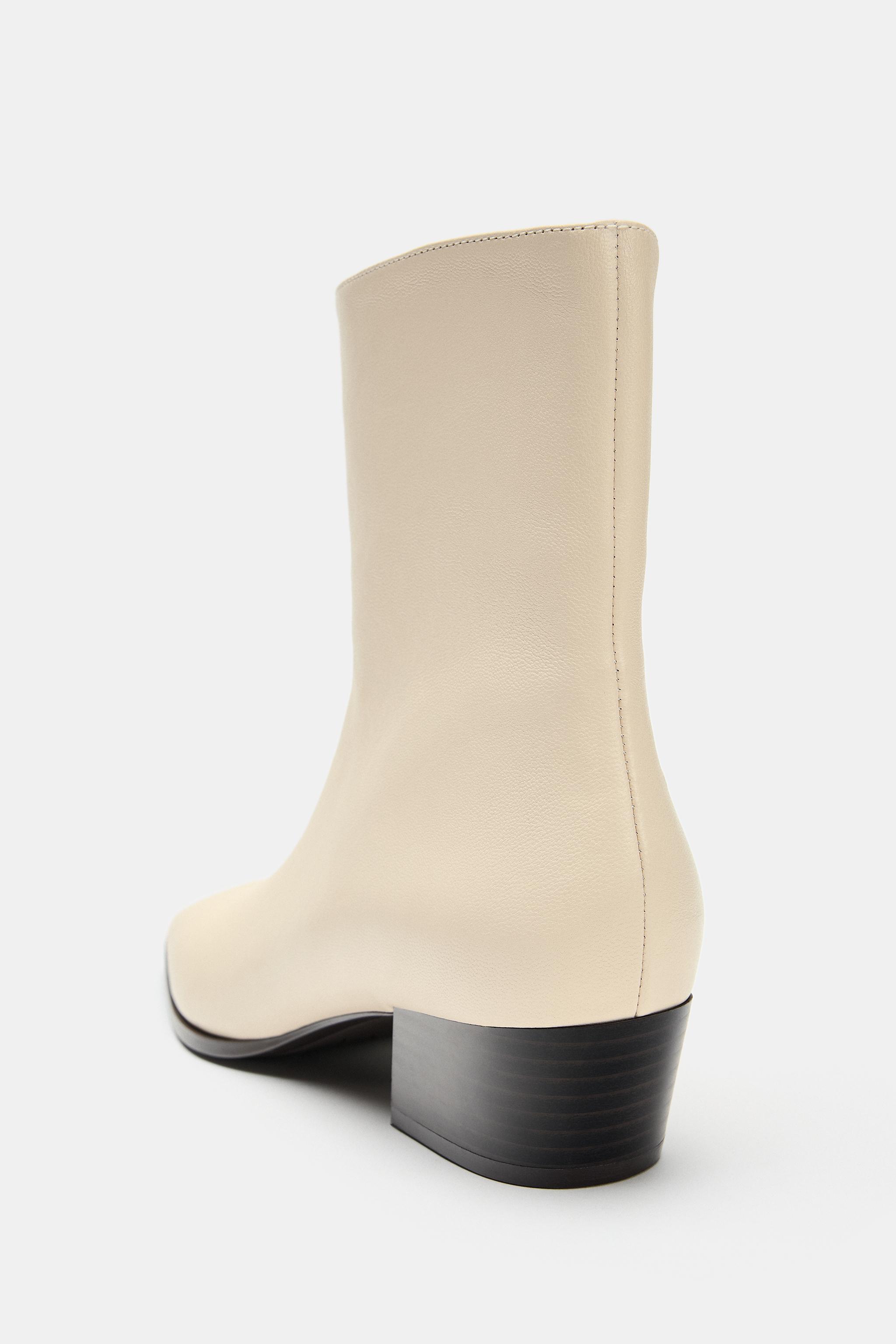 BOTTINES À TALONS EN CUIR