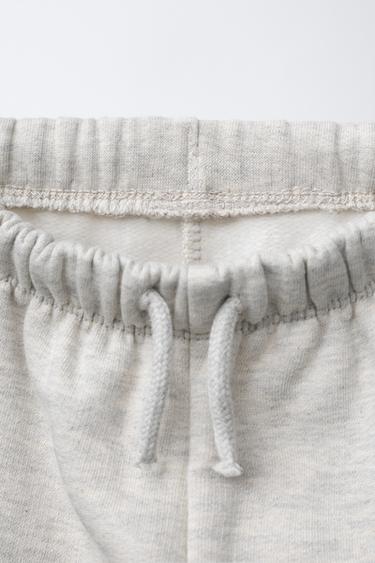 PANTALON MOLLETON À POCHES IMPRIMÉ - Gris chiné de Zara - Image 3