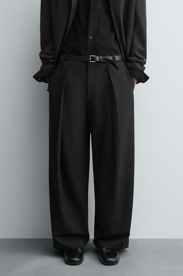 PANTALÓN RELAXED FIT PLIEGUES - Negro de Zara