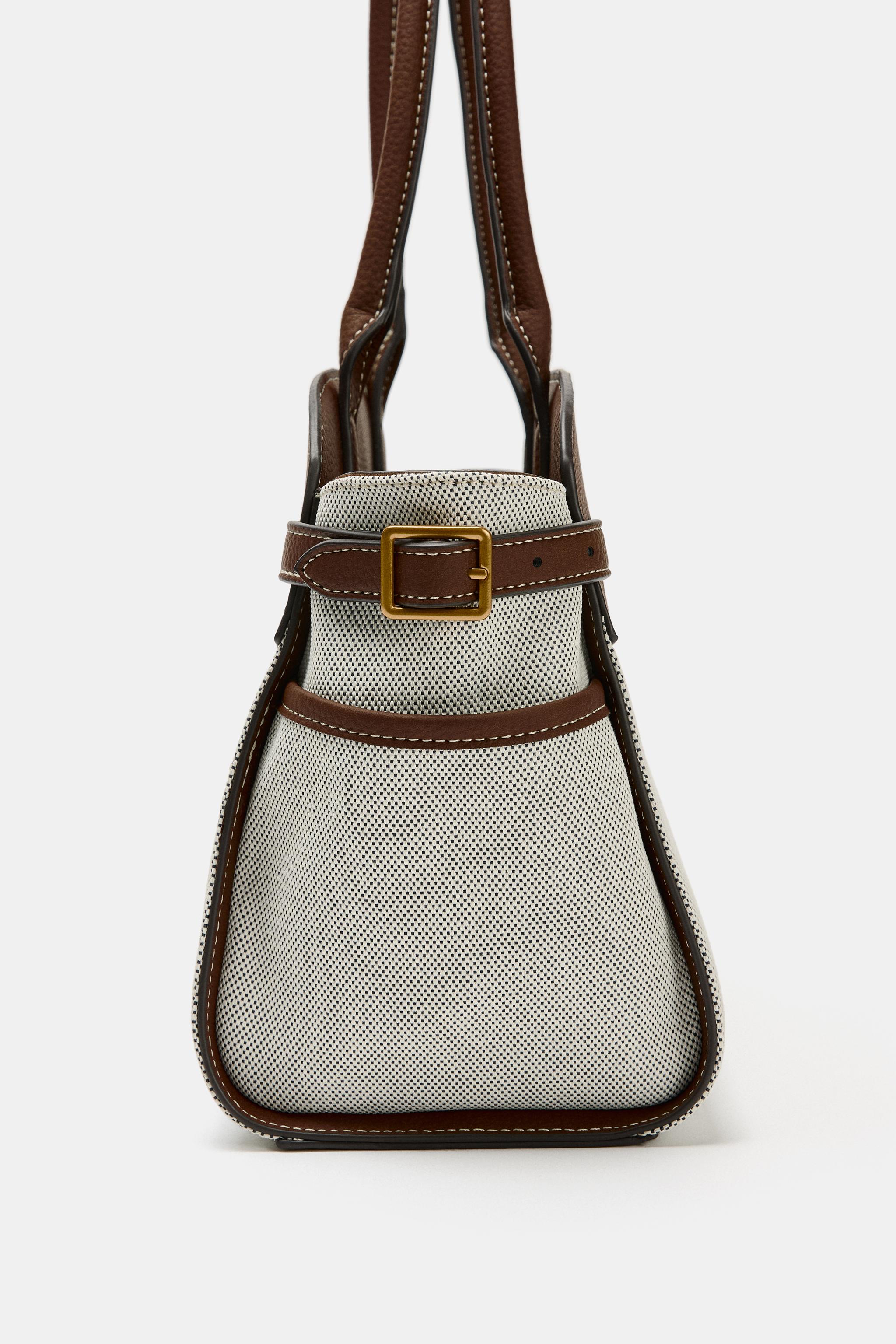 COMBINATION BUCKLE CITY BAG
