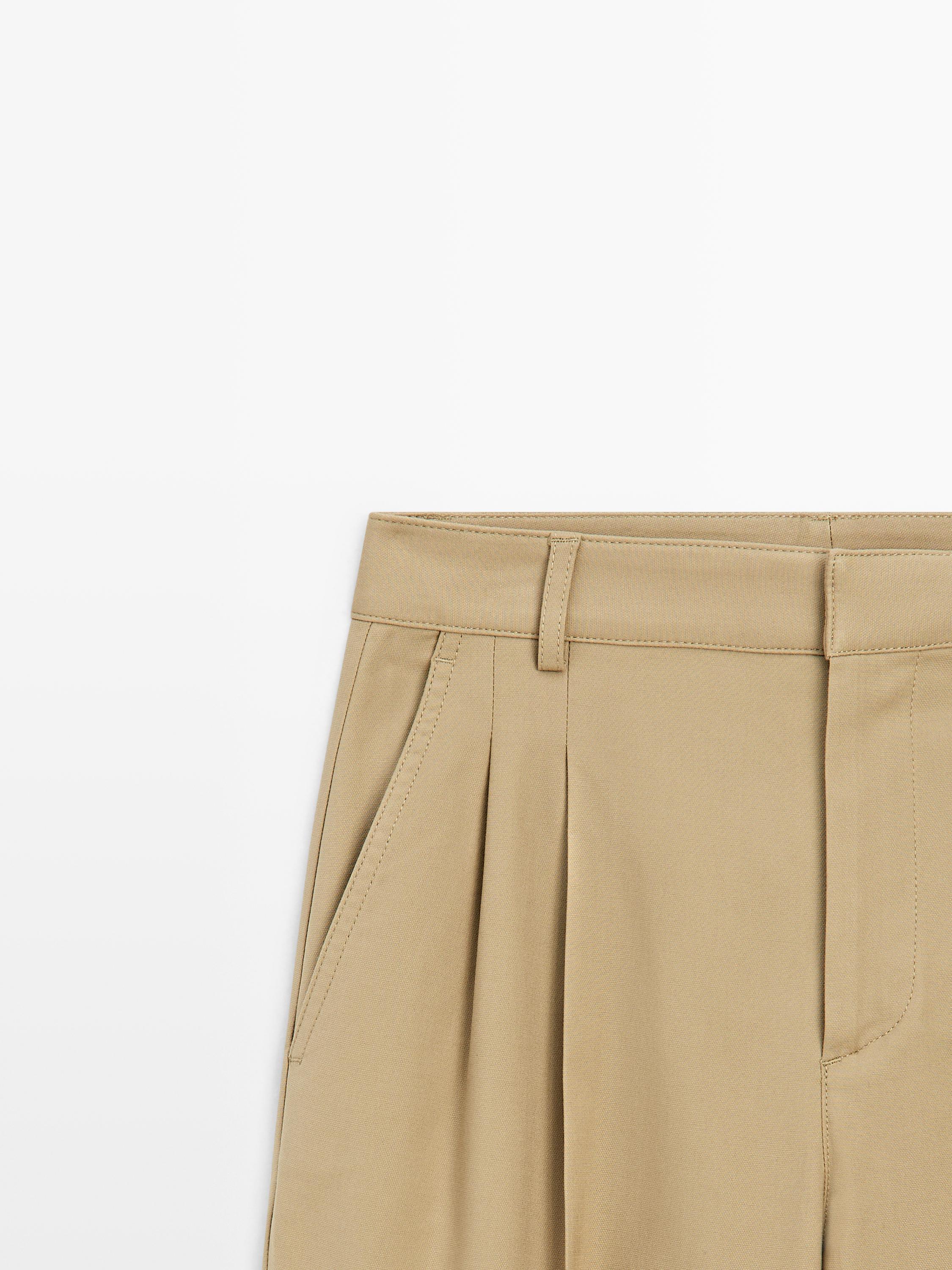 Straight fit pants with pleated details