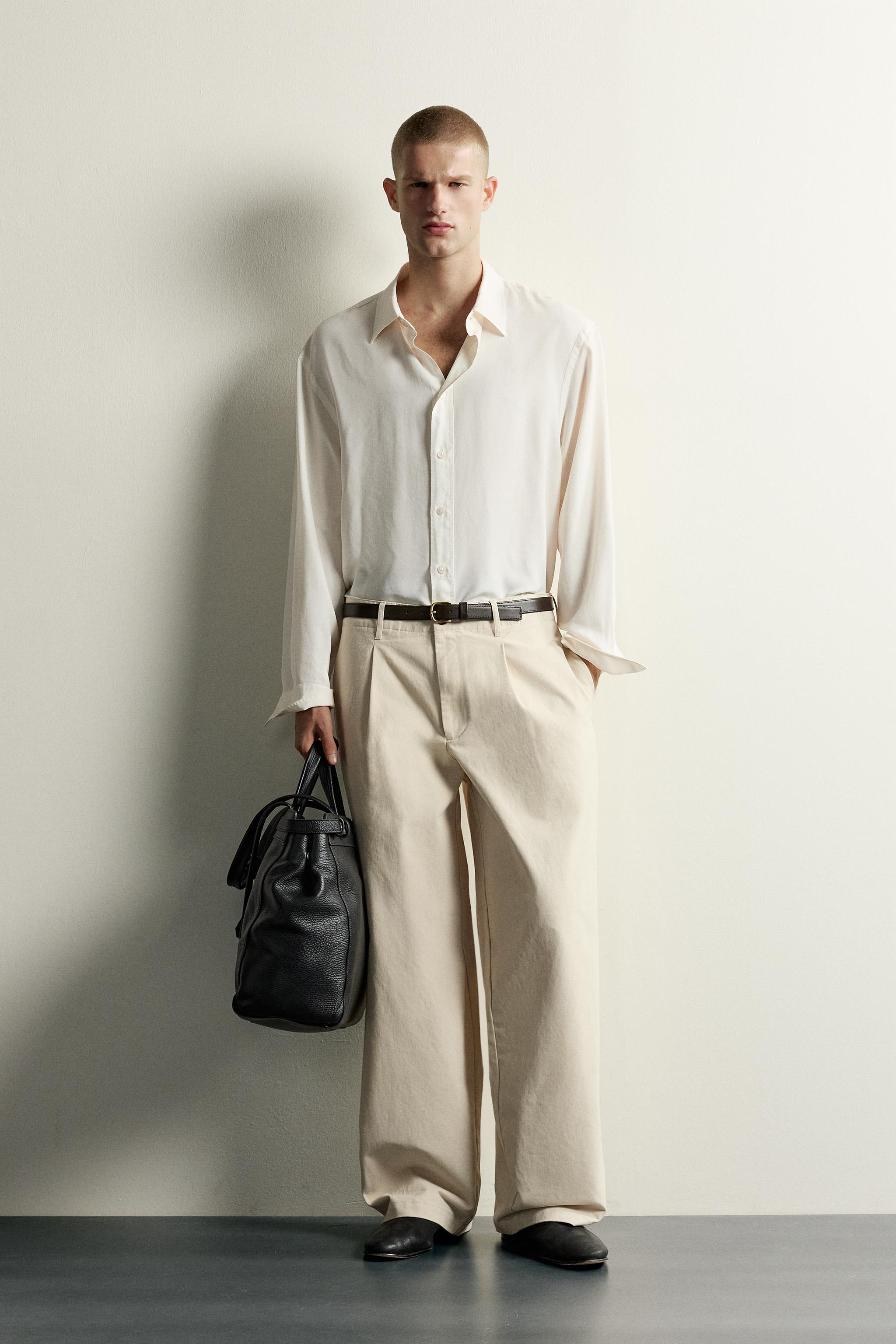 RELAXED FIT PLEATED PANTS