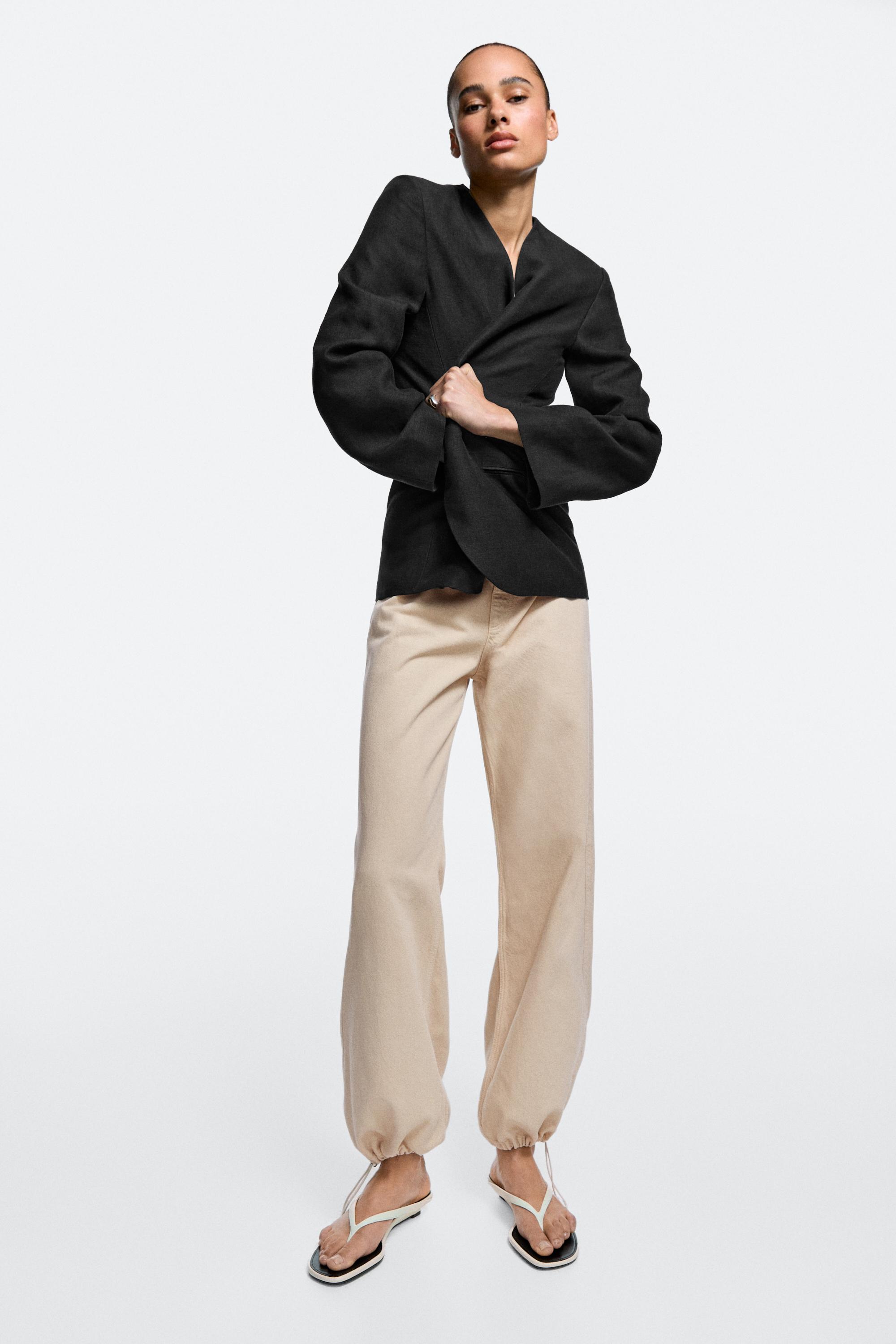 Relaxed fit parachute pants — Beige