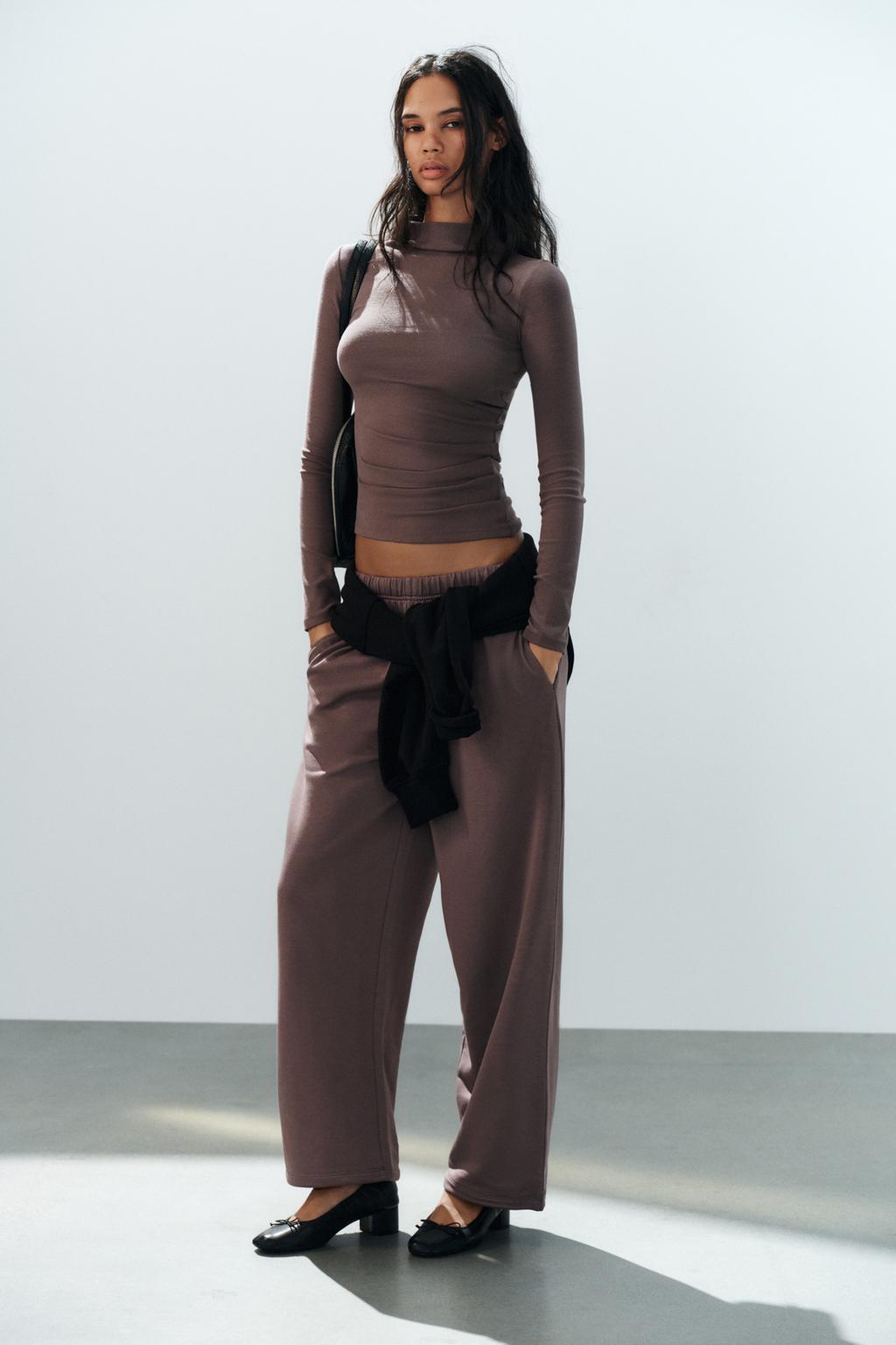 ASYMMETRIC HEM TOP