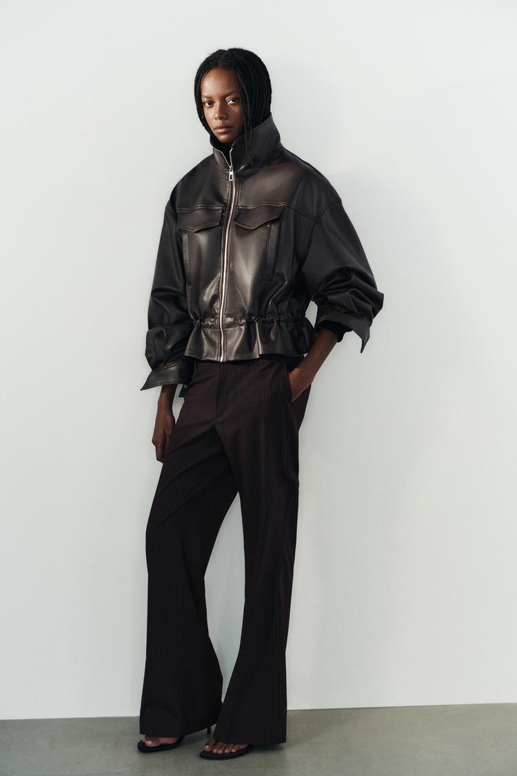 Chaqueta de efecto cuero con cintura ajustable 6