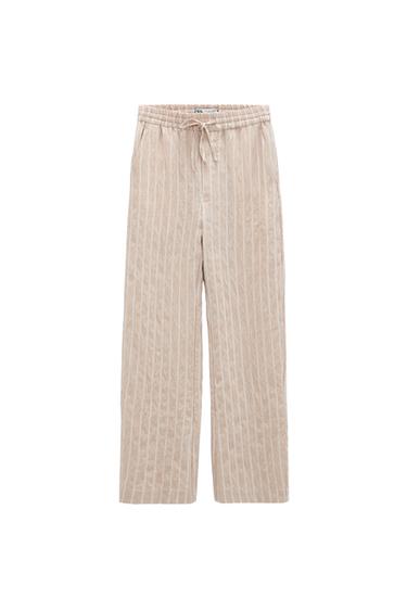 STRIPED STRUCTURED TROUSERS