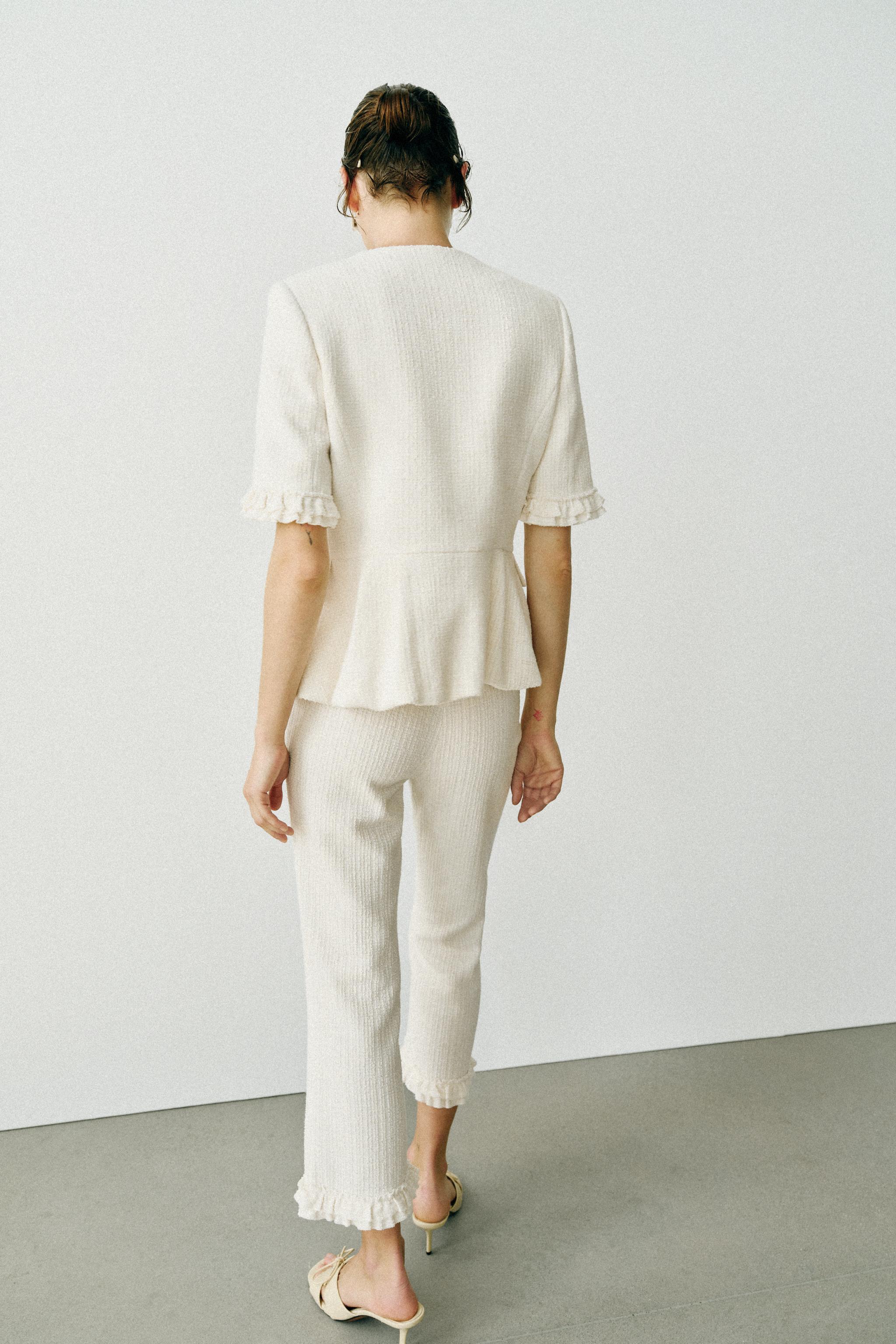 SHORT-SLEEVE RUFFLED PEPLUM JACKET