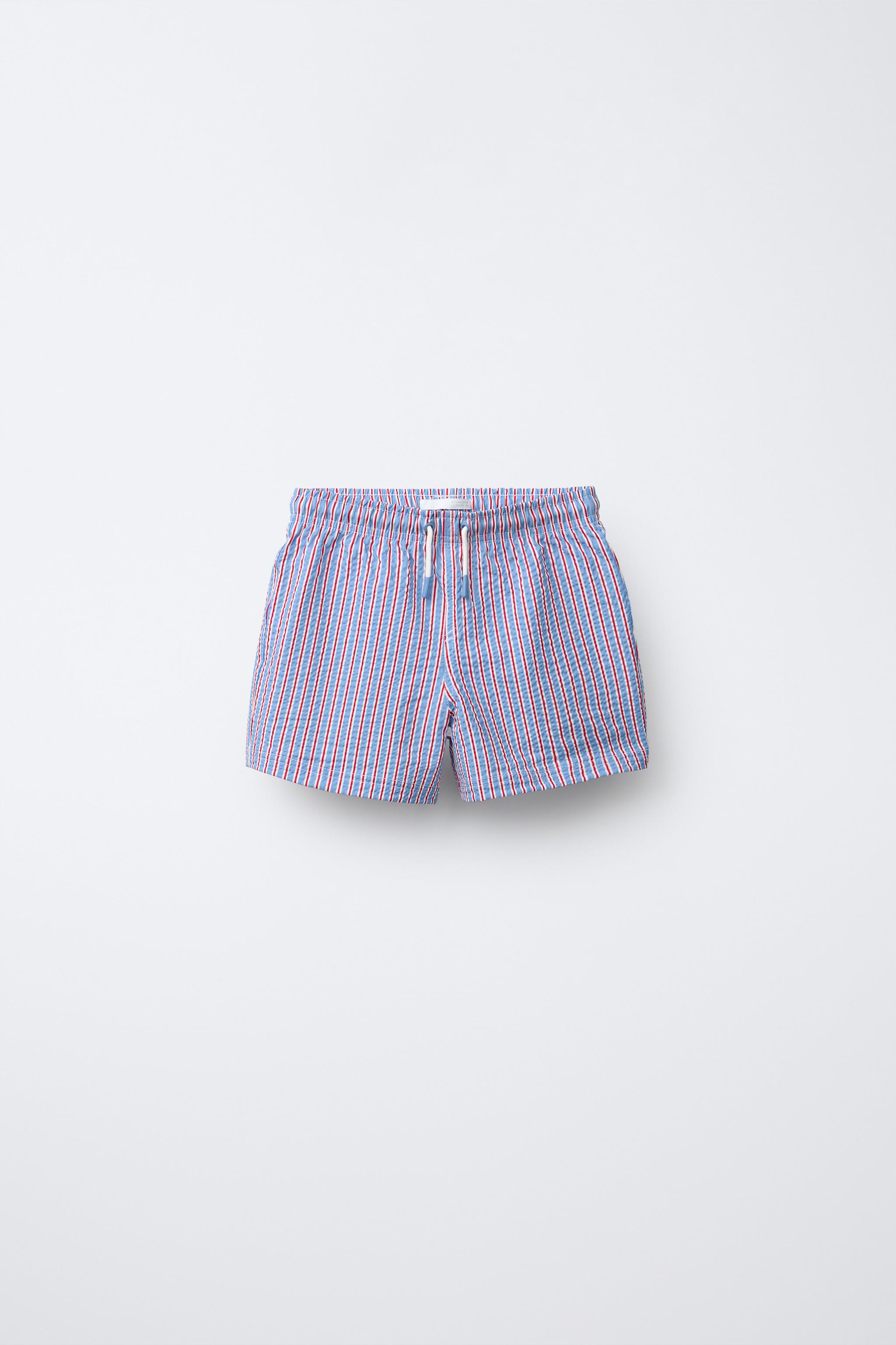 6-14 YEARS / STRIPED SWIM SHORTS