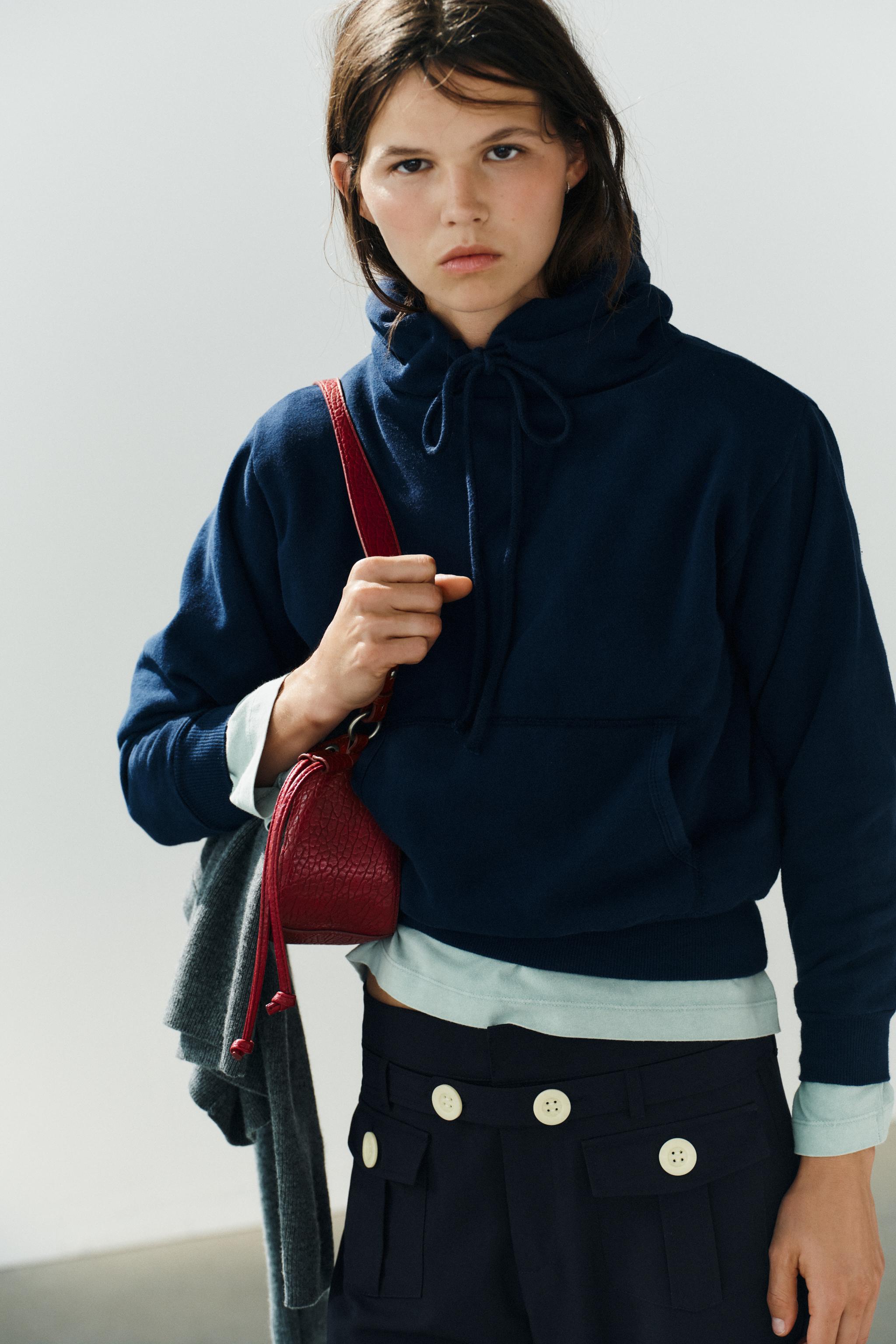 STRAIGHT-LEG TROUSERS WITH CONTRAST BUTTONS