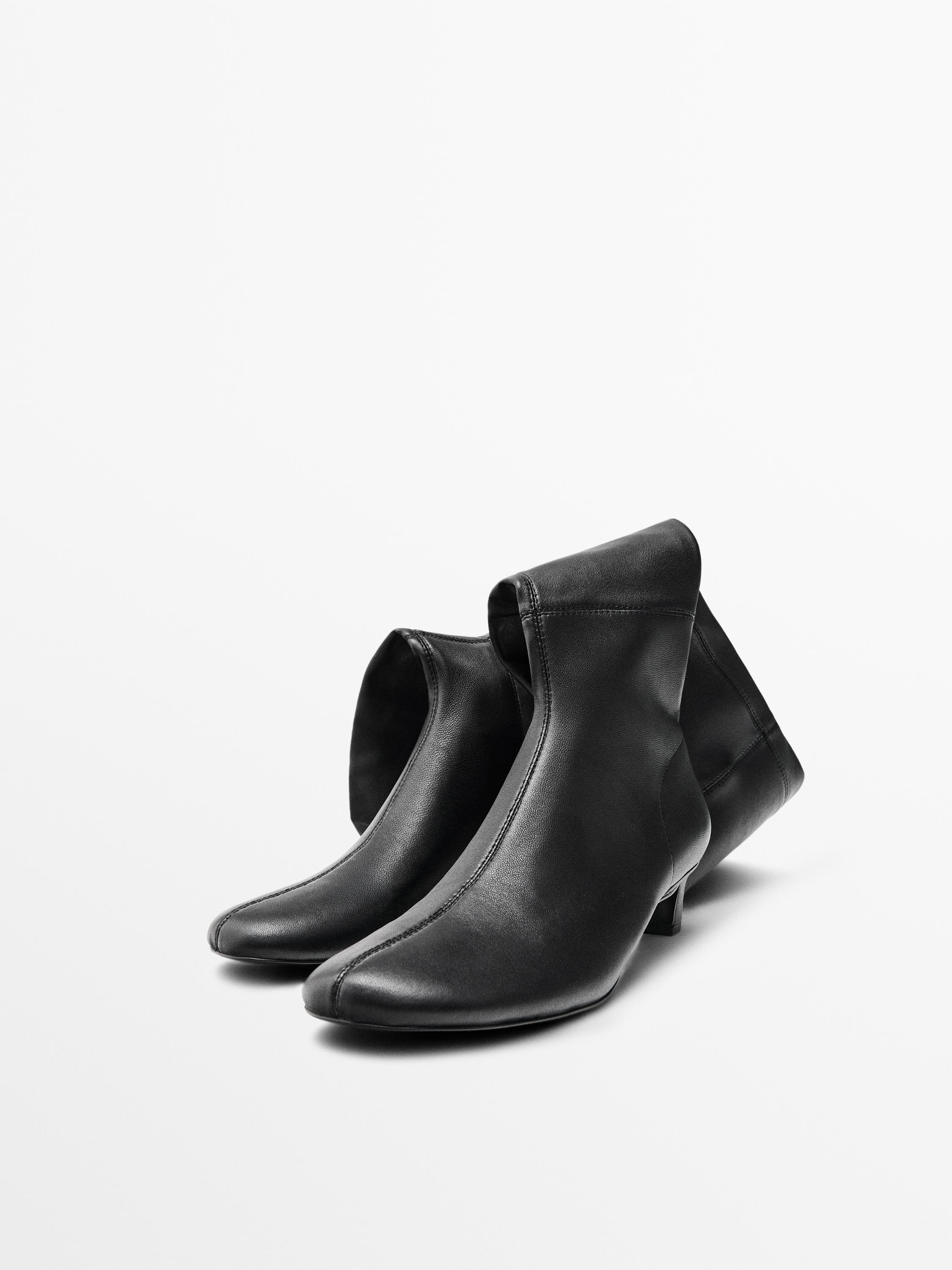 Stretch high-heel boots
