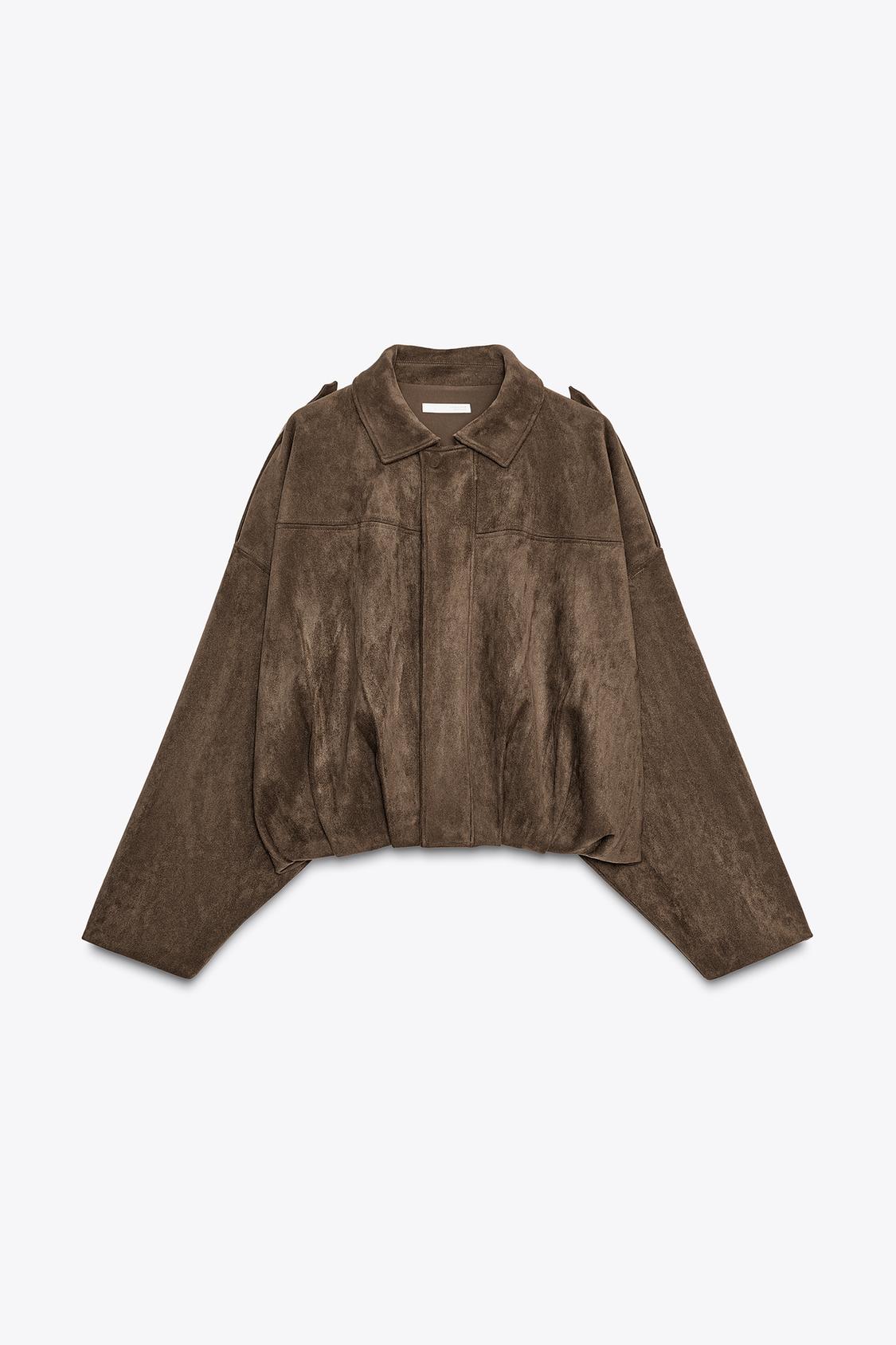 Front view of brown bomber jacket with lapel collar, long sleeves and concealed front fastening. Hem with pleats and volume.