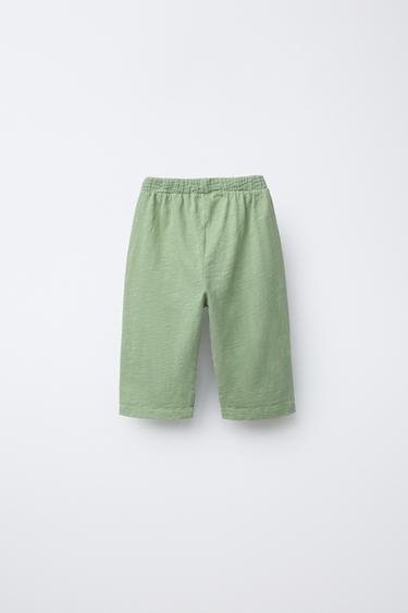 PANTALON EN MATIÈRES VARIÉES À TEXTURE ET MOLLETON - Vert de Zara - Image 1