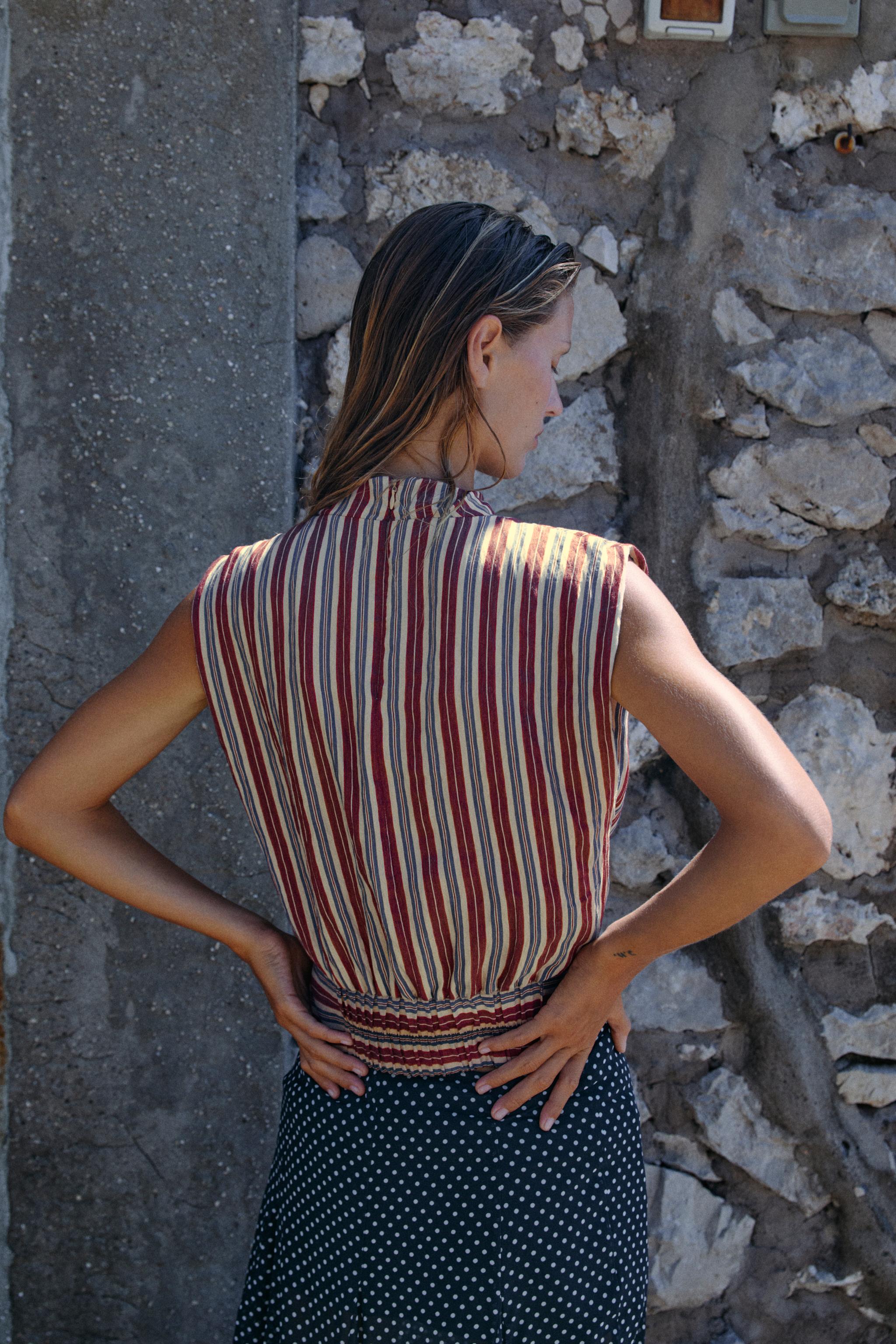 STRIPED TOP WITH KNOT DETAIL