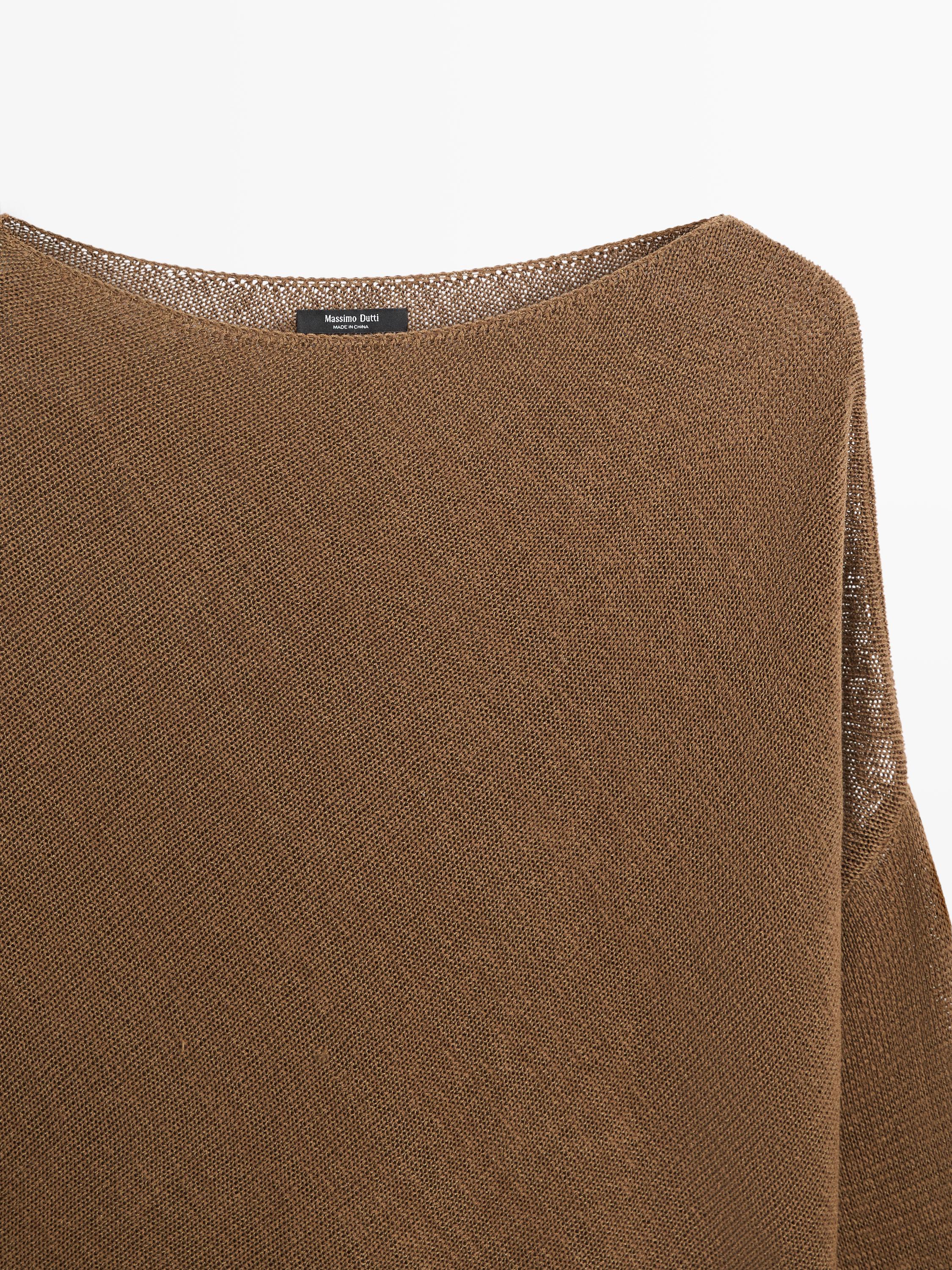 Asymmetric knit cape sweater