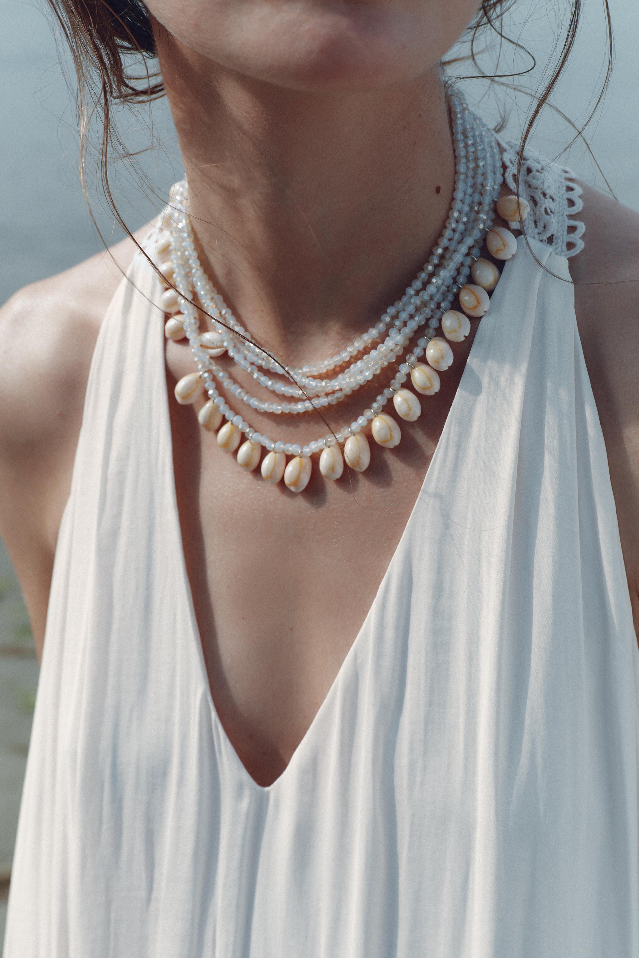 COLLIER BRILLANTS COQUILLAGES