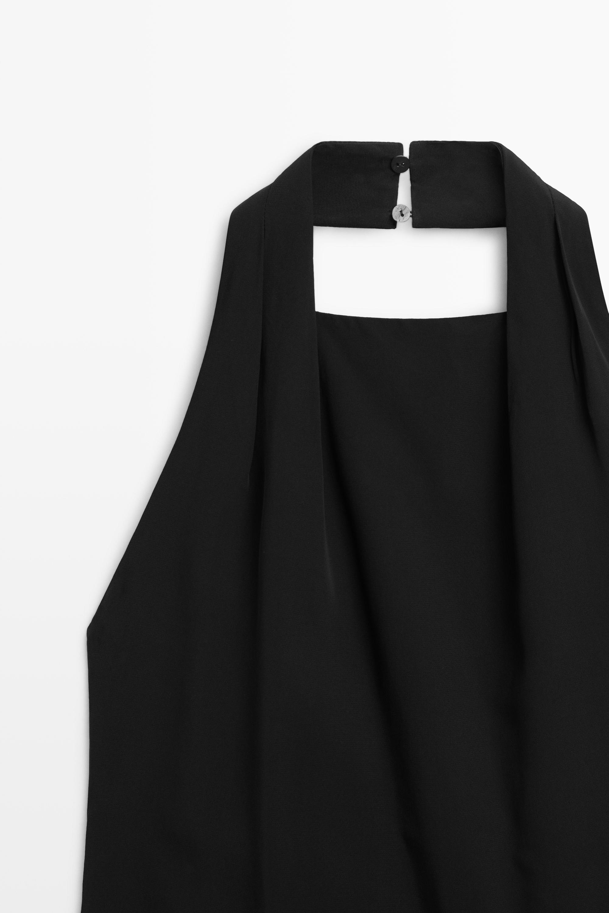Flowing open-back top