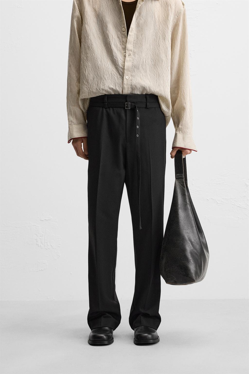 FLARED FIT TROUSERS WITH BELT