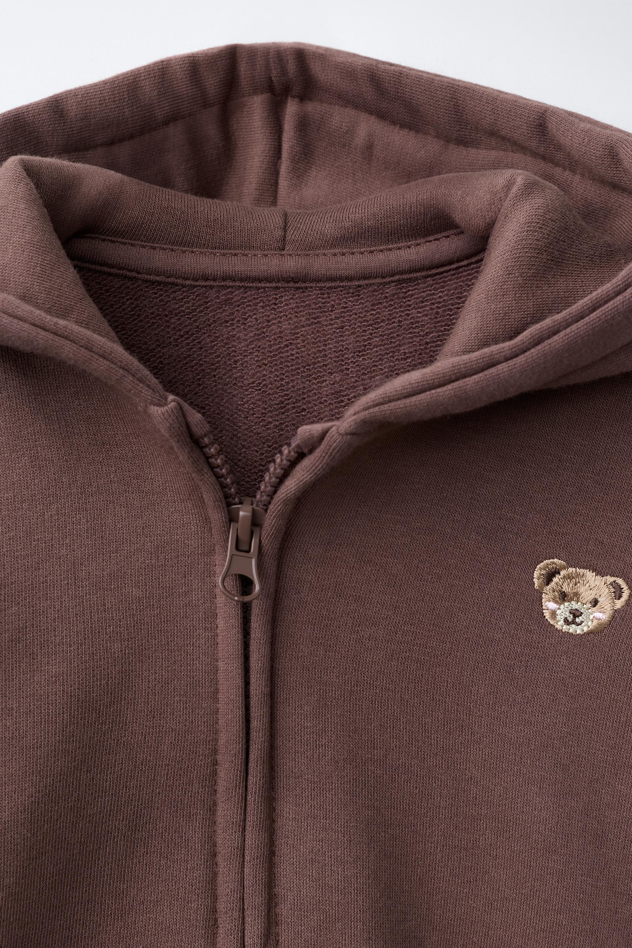 EMBROIDERED BEAR ZIP UP HOODIE