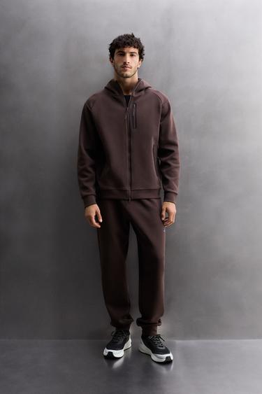 PANTALÓN TÉCNICO CREMALLERA - Burgundy de Zara - Imaxe 0