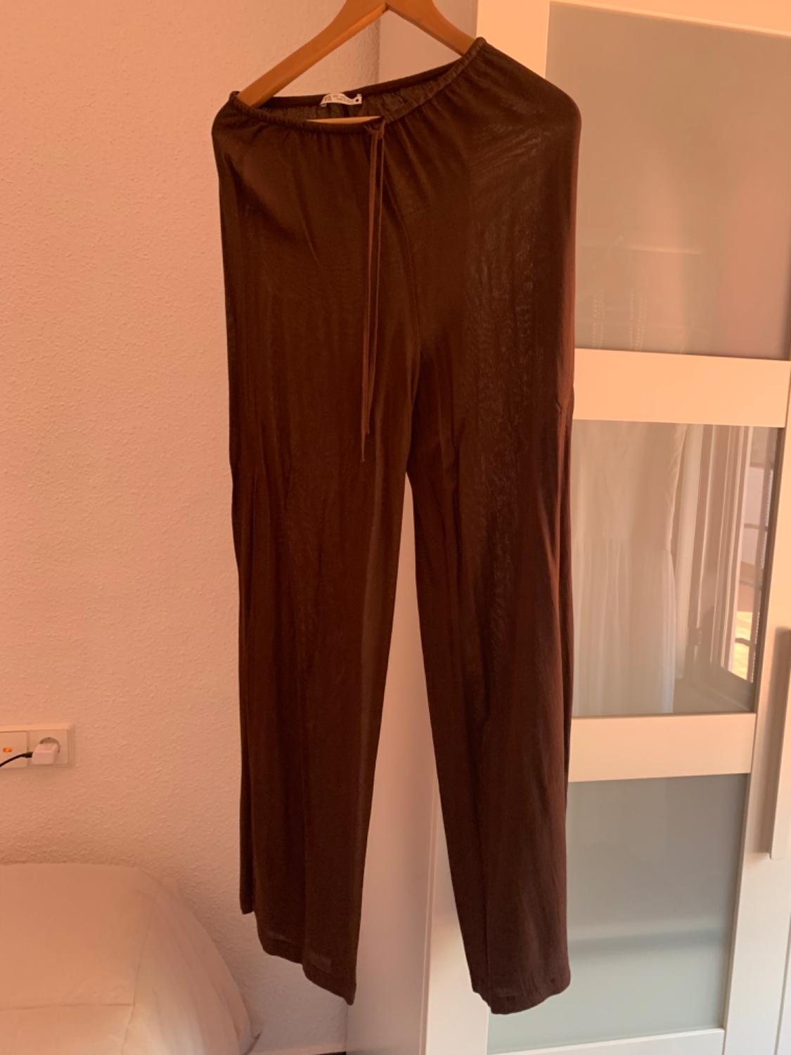 FLARED SATIN-FINISH TROUSERS